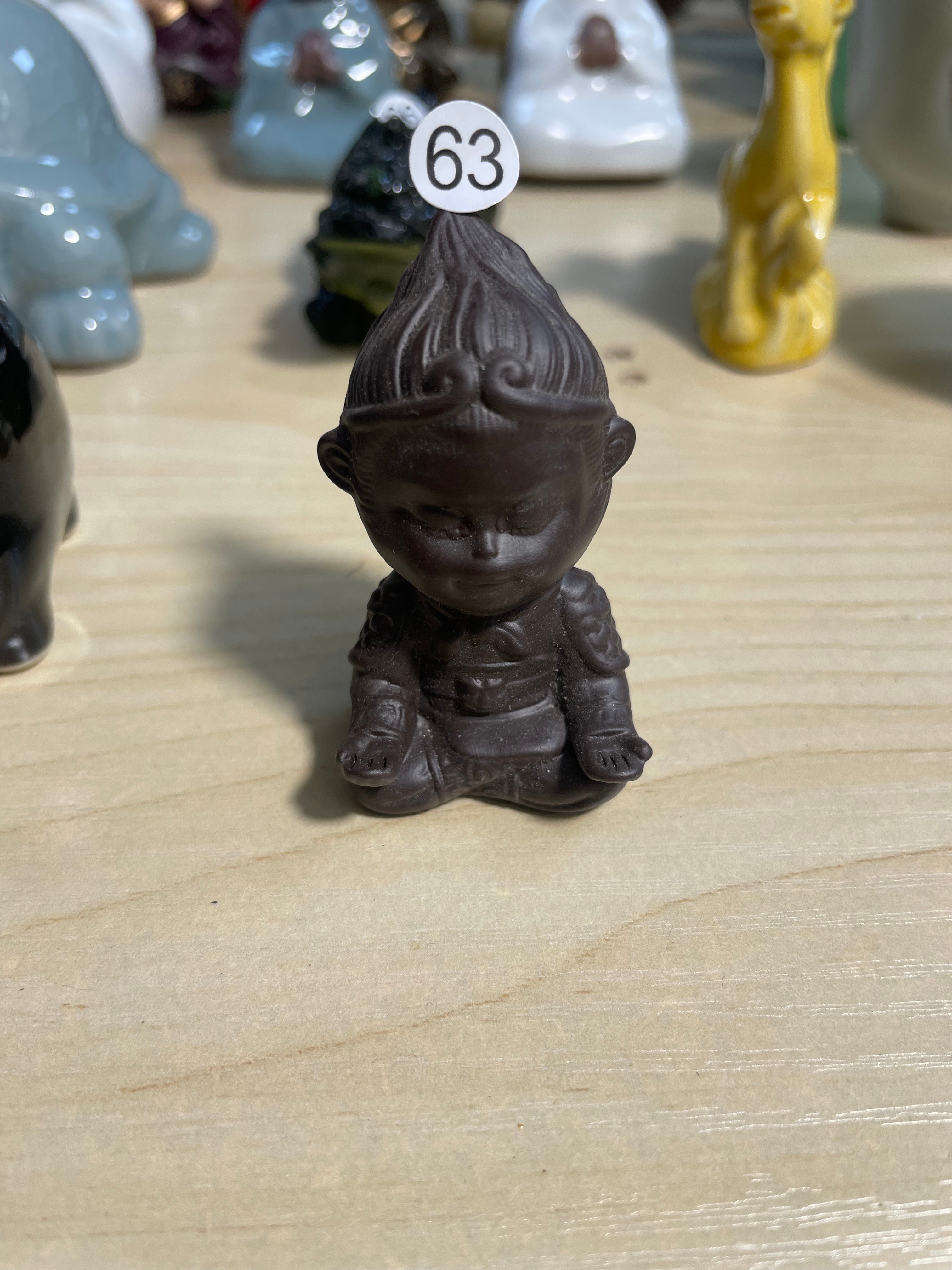 Ceramic Sitting Monk Figurine