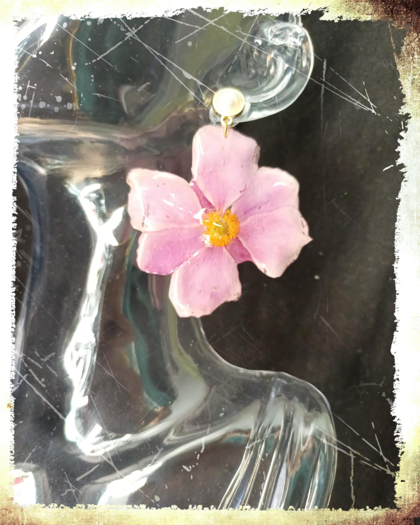 Boucles fleurs d'Anémone du Japon