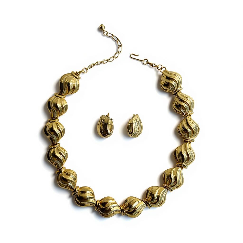 Trifari vintage necklace & earrings set: gold-tone wave design, 1980s