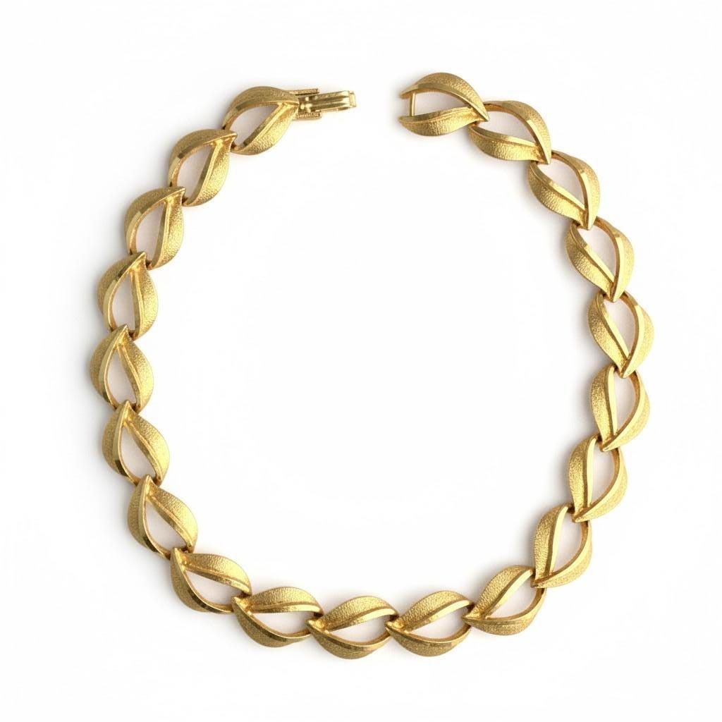 Vintage Gold Tone Leaf Link Necklace: Textured Curved Design with Fold Over Clasp