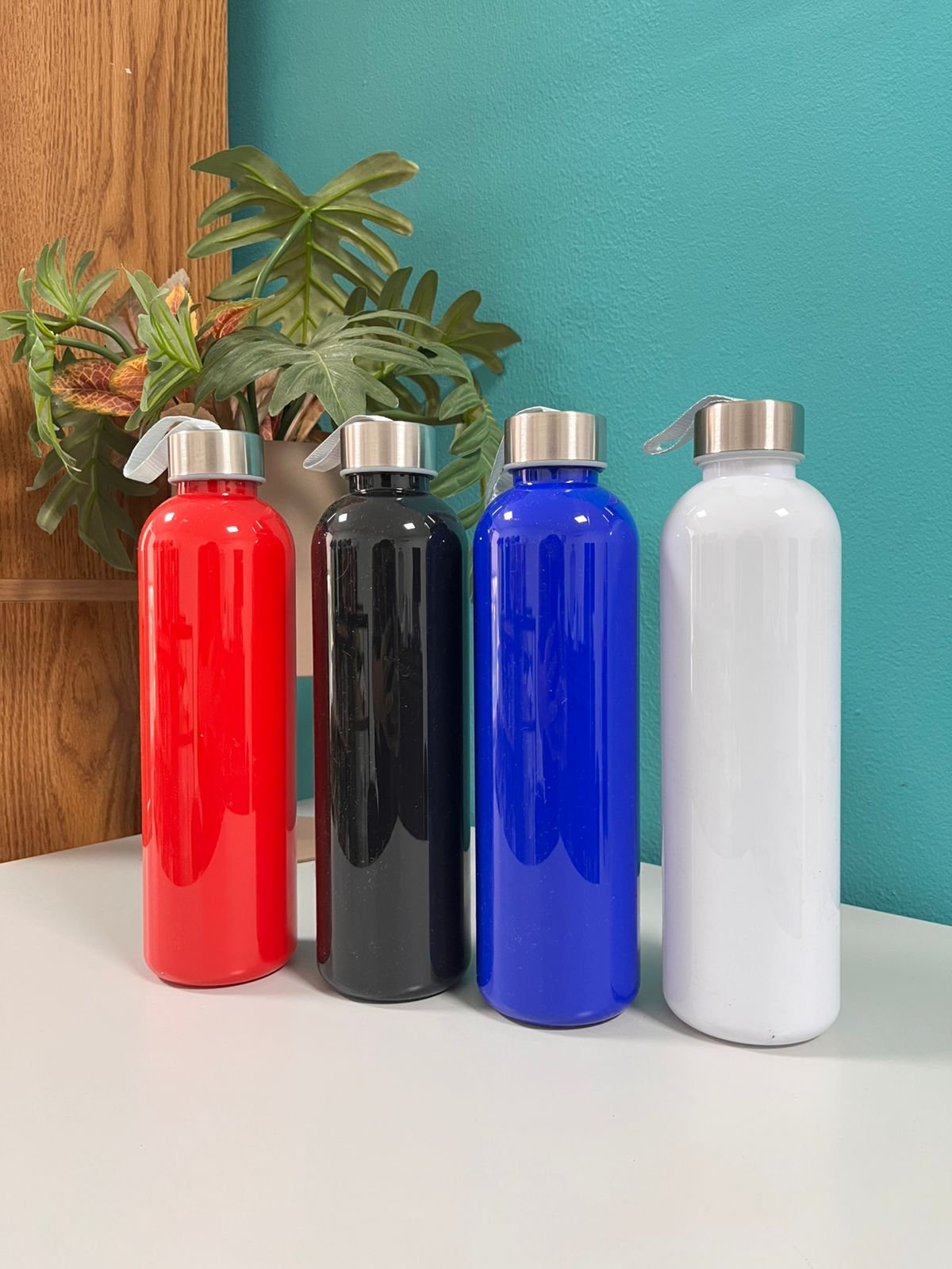 Botella Plástica con Tapa de Acero Inoxidable