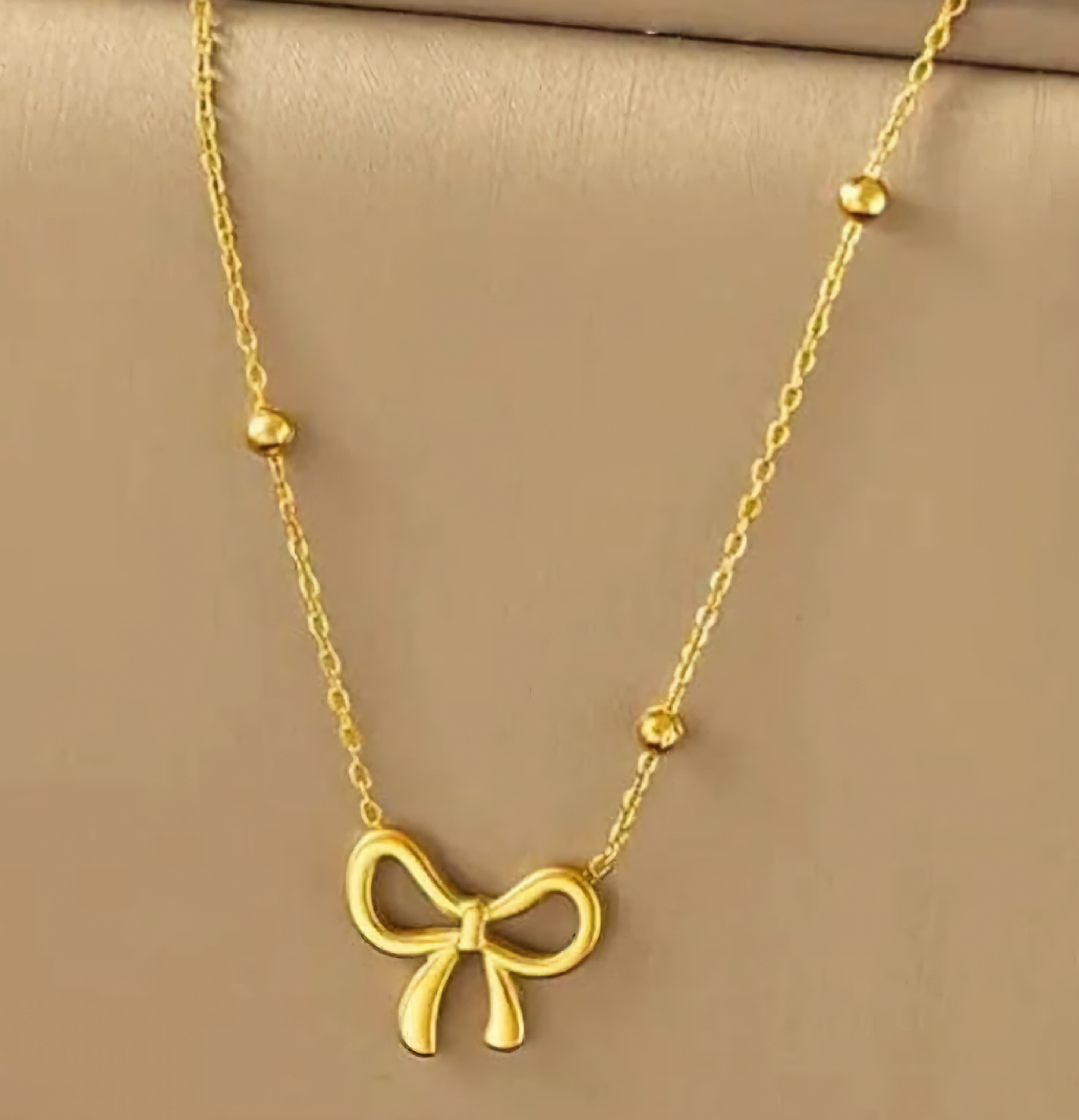 Gold Bow Pendant Necklace