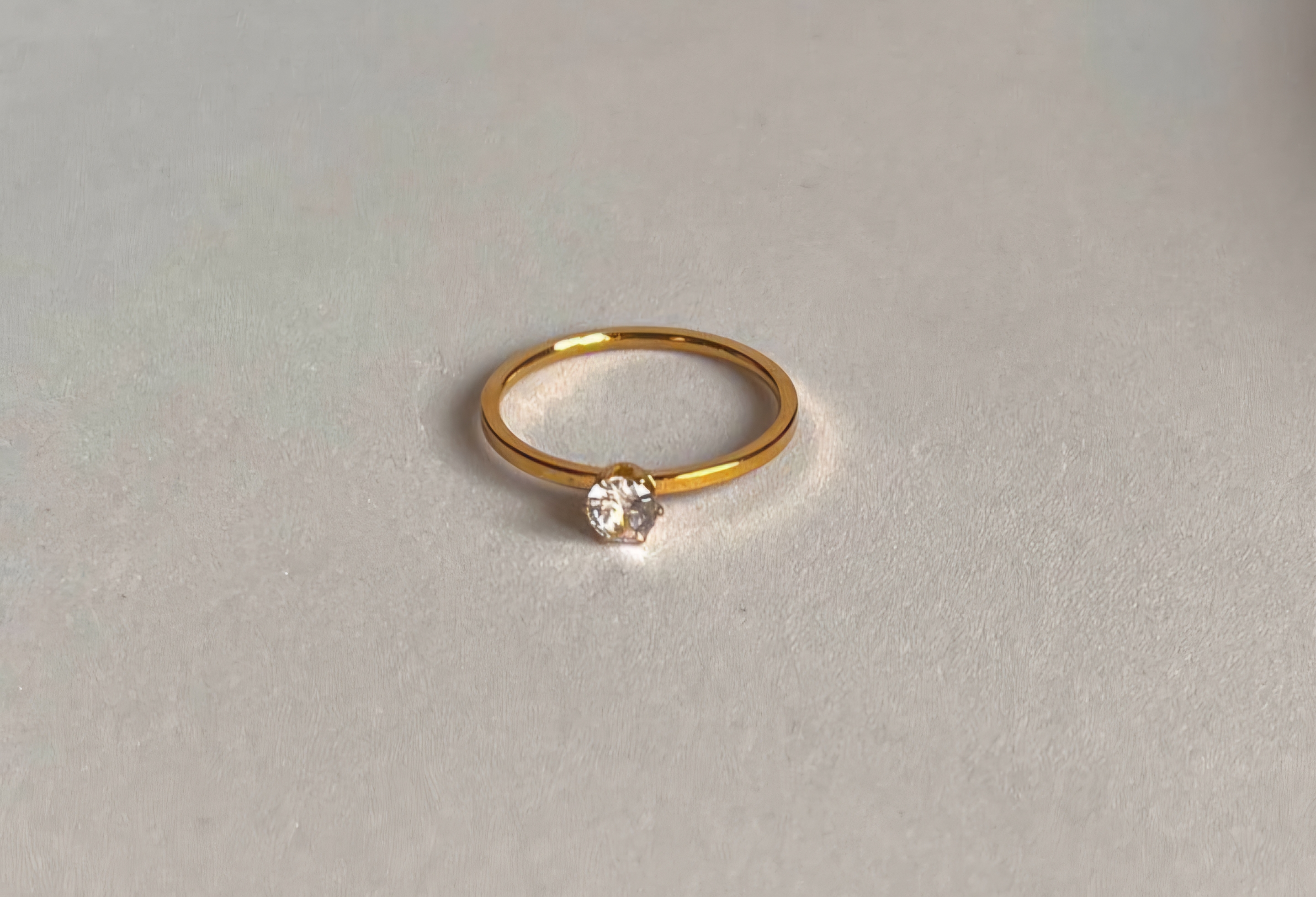 Gold solitaire diamond ring