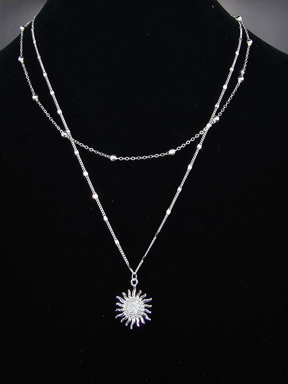 Collar doble con dije de sol