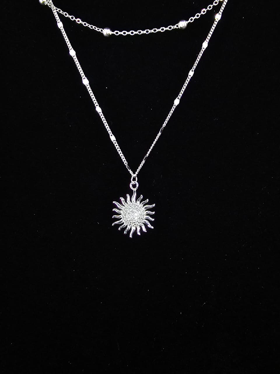 Collar doble con dije de sol