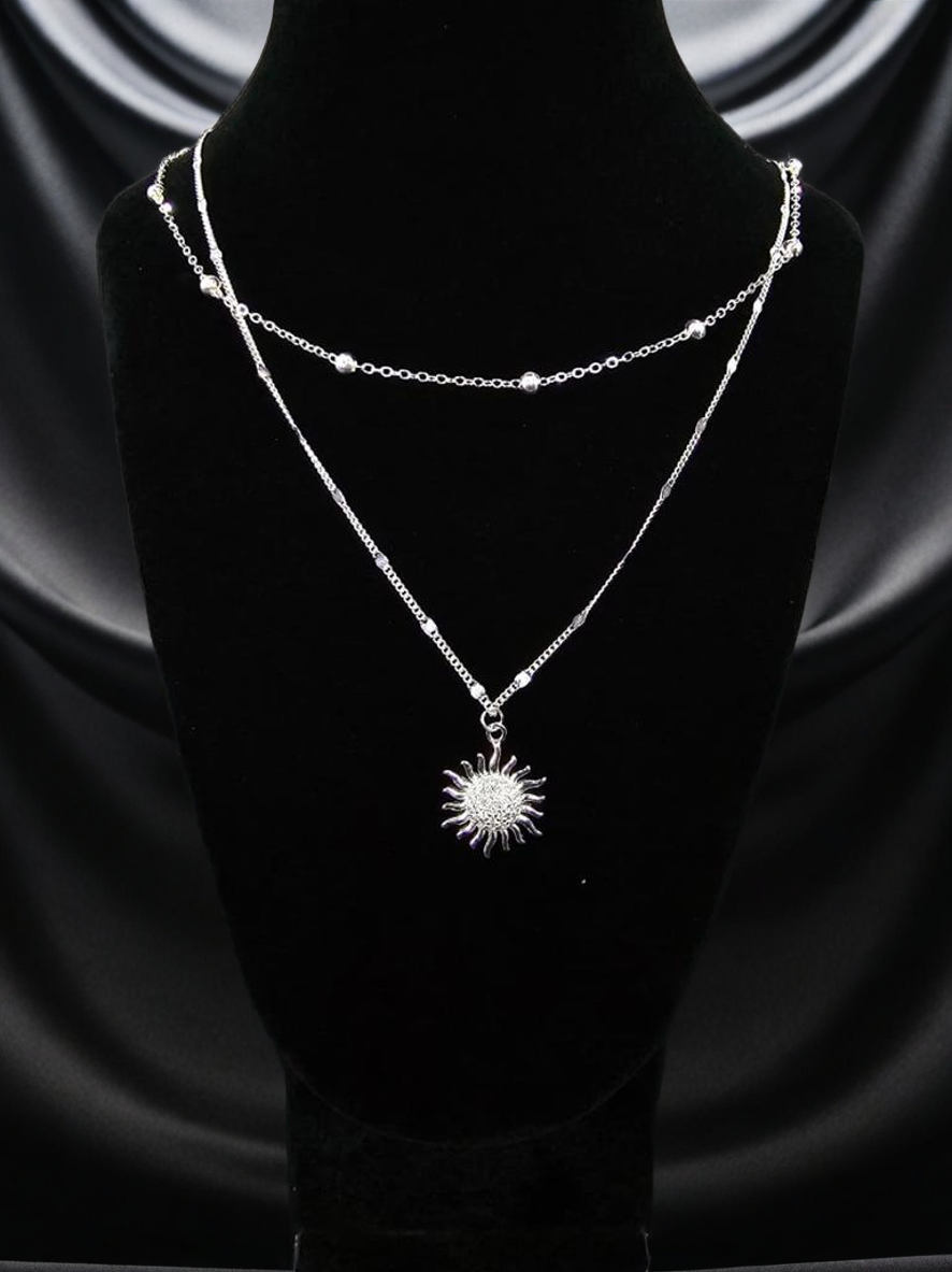 Collar doble con dije de sol