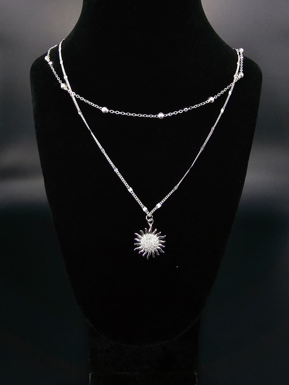 Collar doble con dije de sol