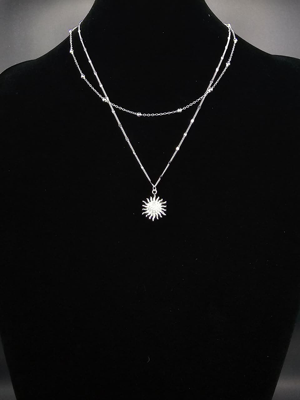 Collar doble con dije de sol