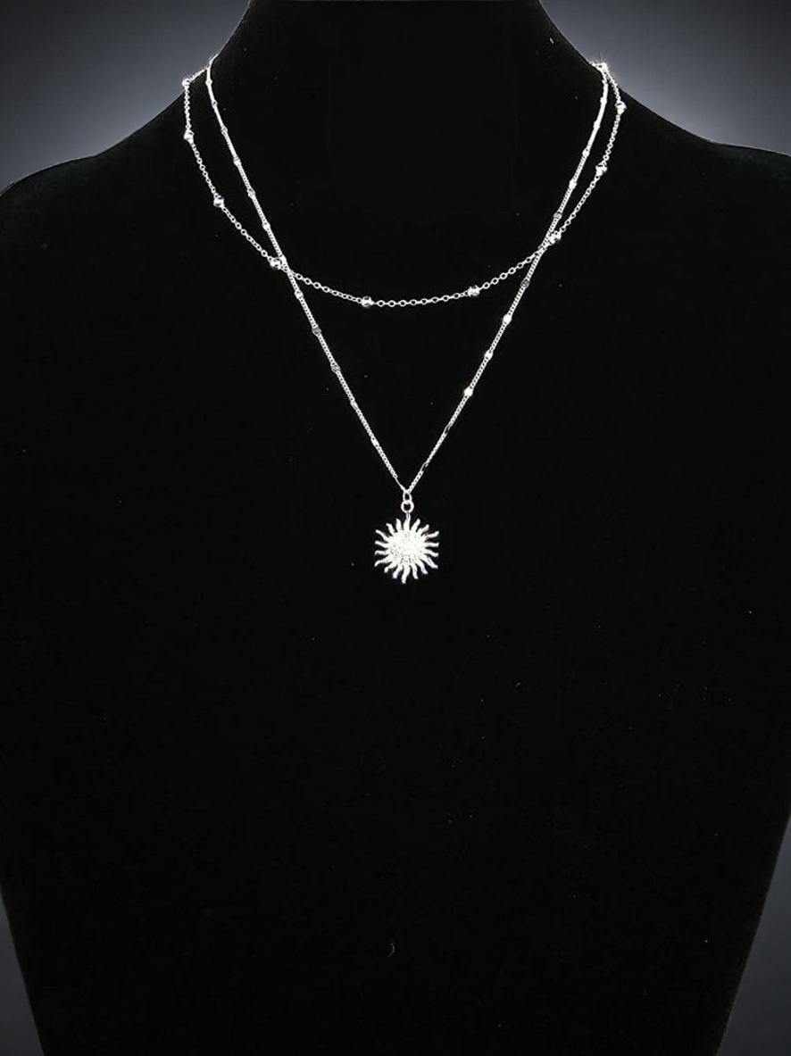 Collar doble con dije de sol