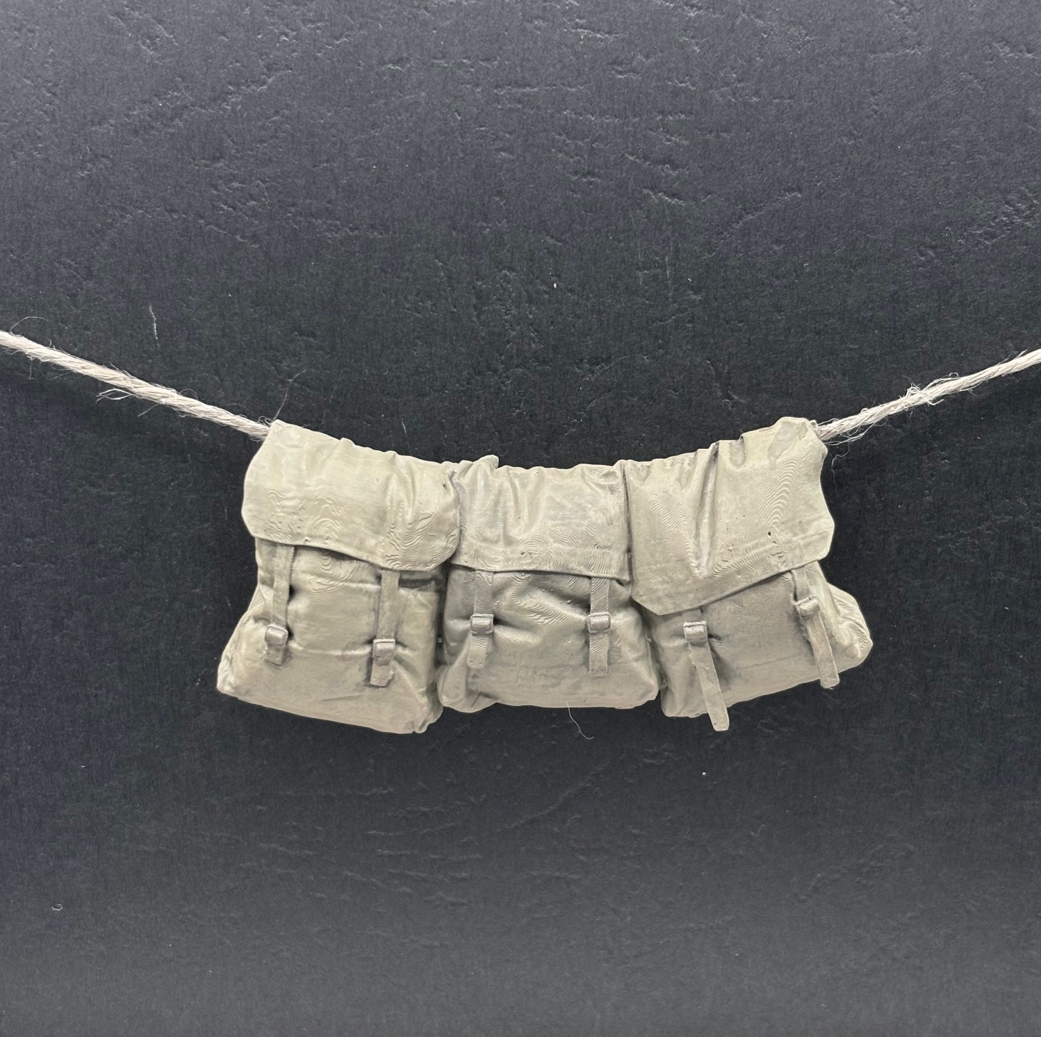 37 Pattern packs hanging on rope.