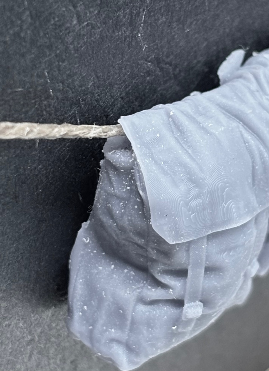 37 Pattern packs hanging on rope.