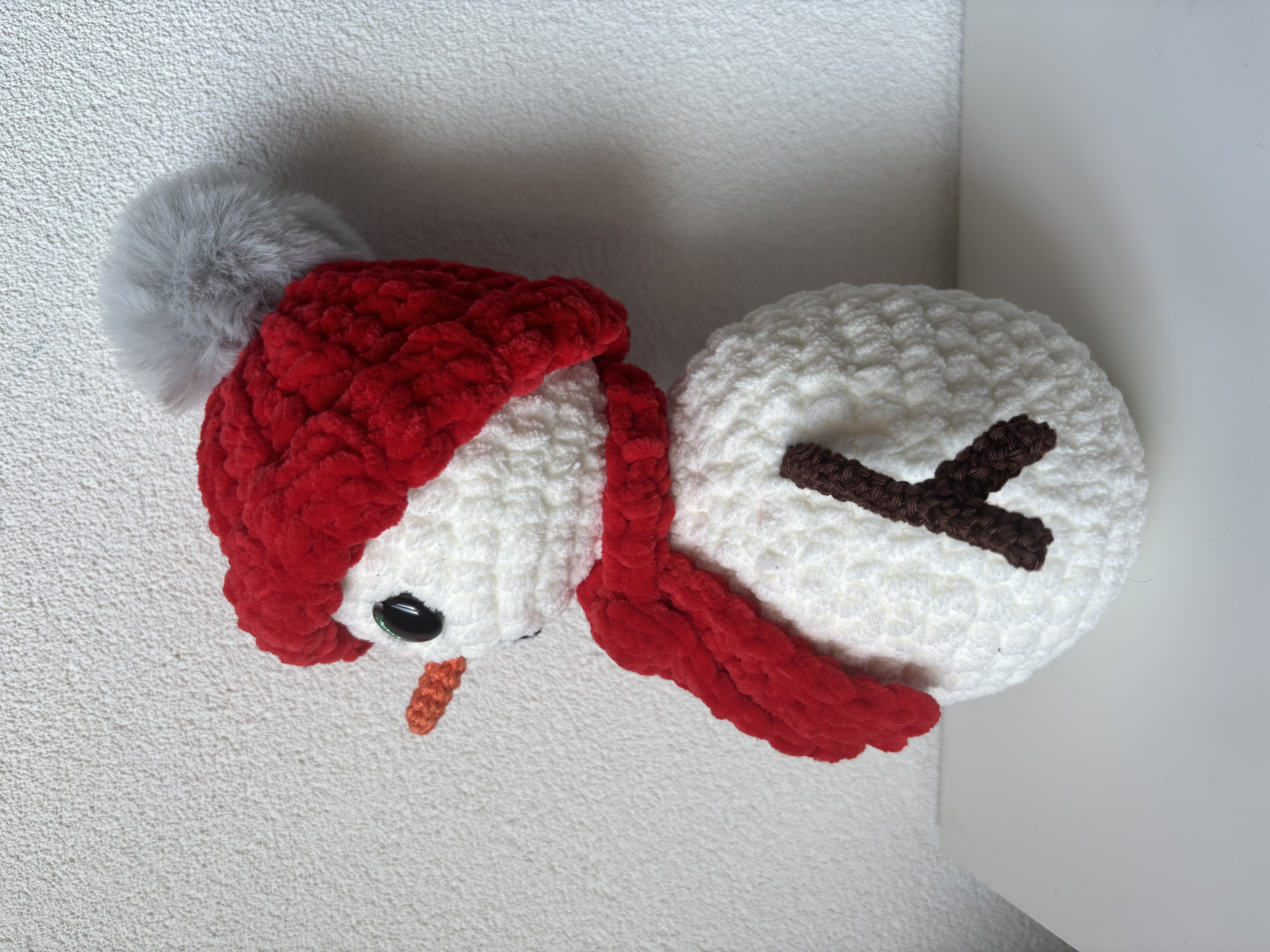 Gehaakte sneeuwpop knuffel