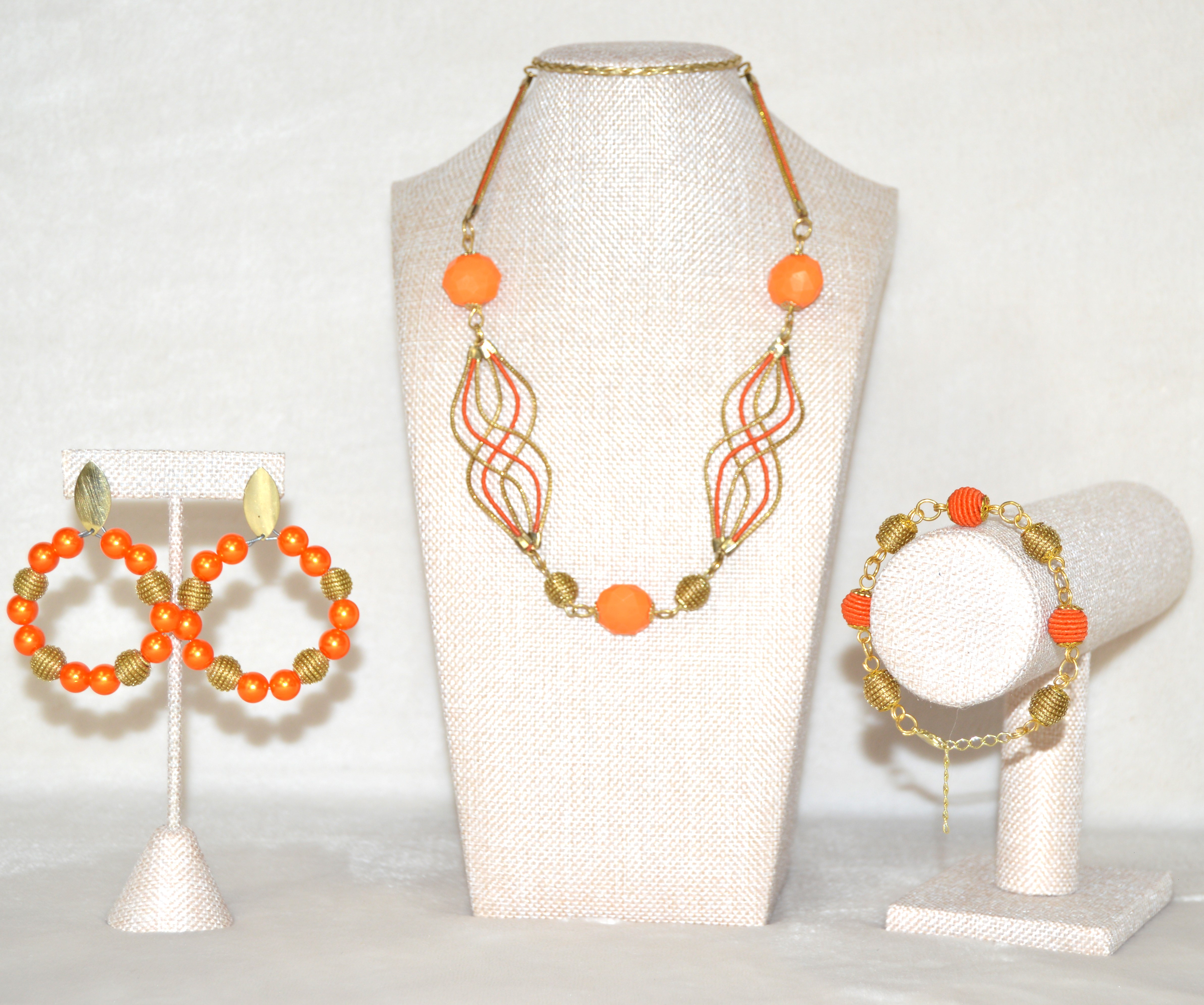 Elegant Necklace, Bracelet, and Earrings with Golden accents