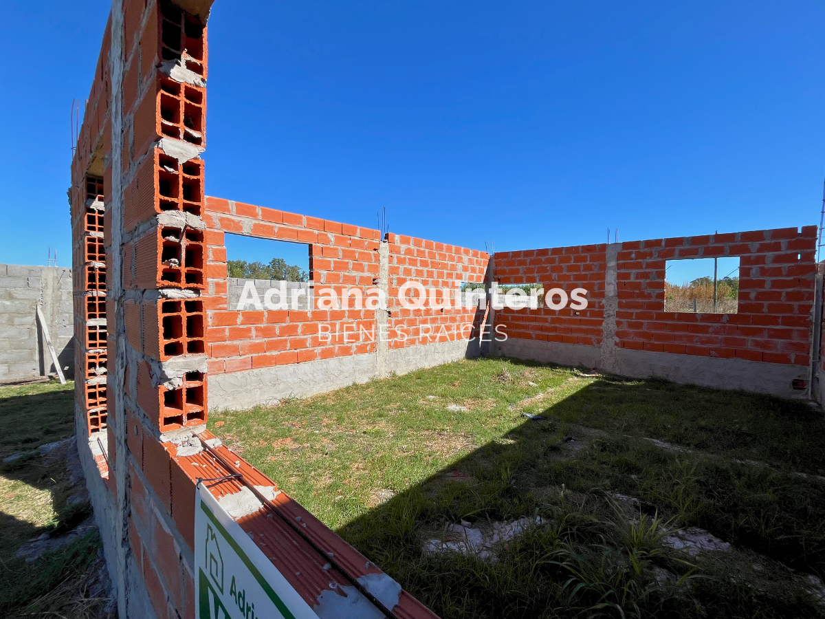 Lote 250 m² con construcción a terminar y escritura en Barrio Boggio  - Villa Rosa