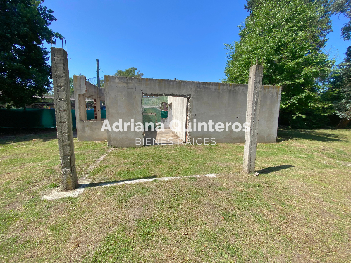 Lote de 1320 m² con construcción a terminar y escritura e impuestos al dia en Villa Rosa