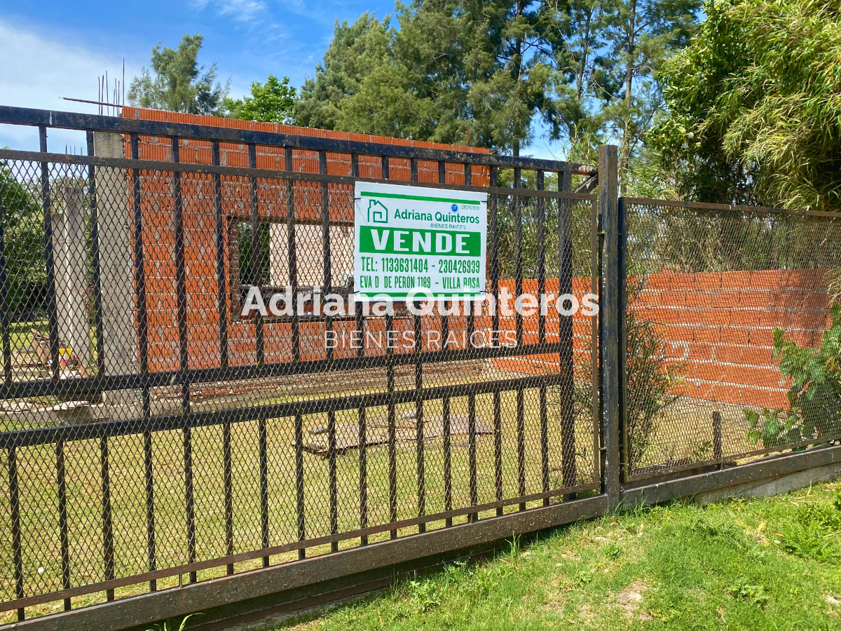 Lote con construccion y escritura e impuestos al dia  en Open Door - Luján. Permuta por vehiculo o propiedad