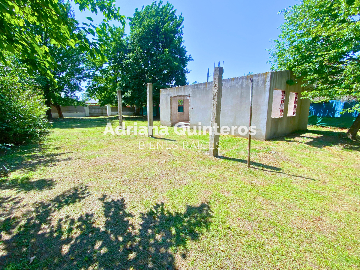 Lote de 1320 m² con construcción a terminar y escritura e impuestos al dia en Villa Rosa