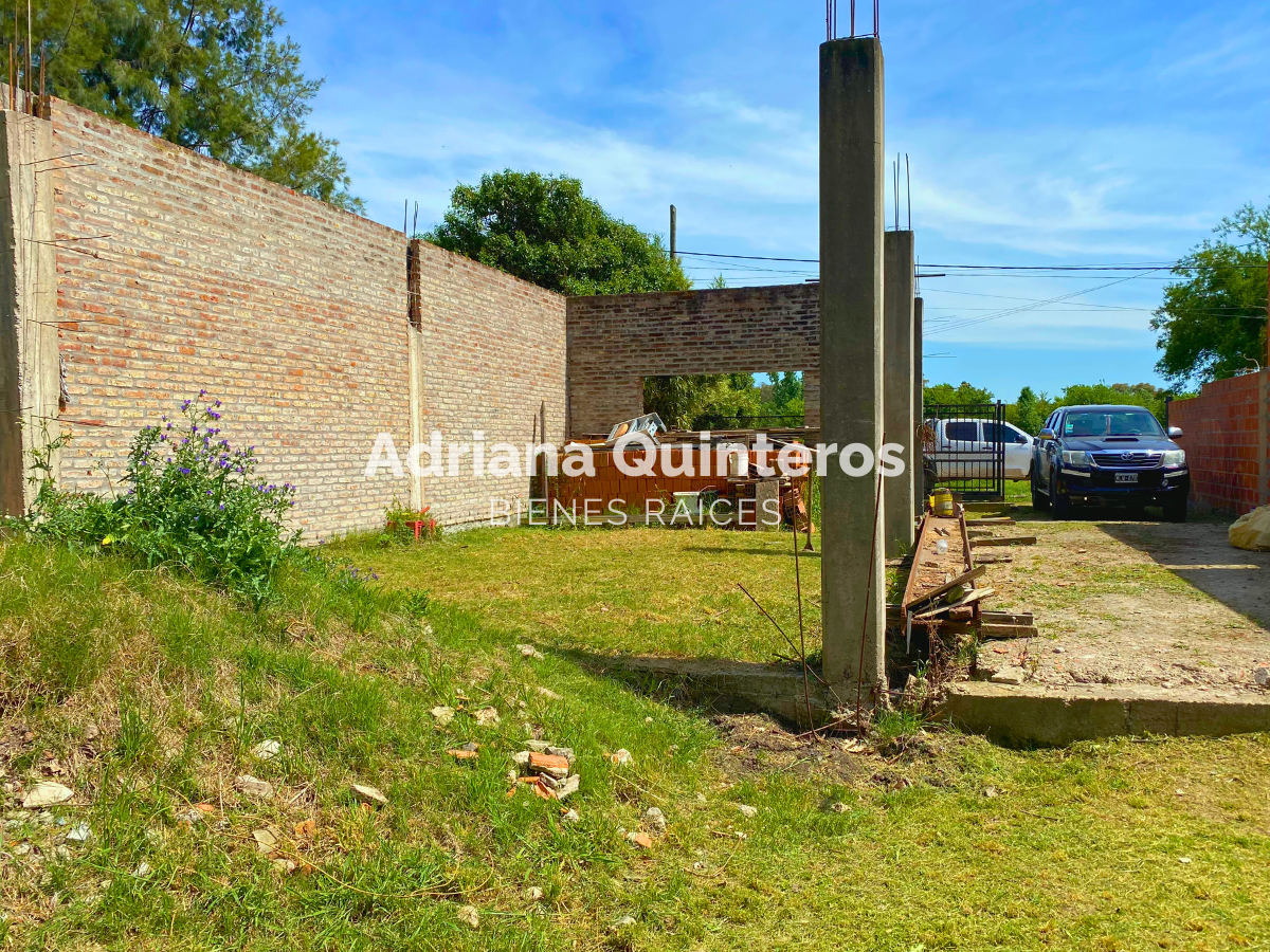 Lote con construccion y escritura e impuestos al dia  en Open Door - Luján. Permuta por vehiculo o propiedad