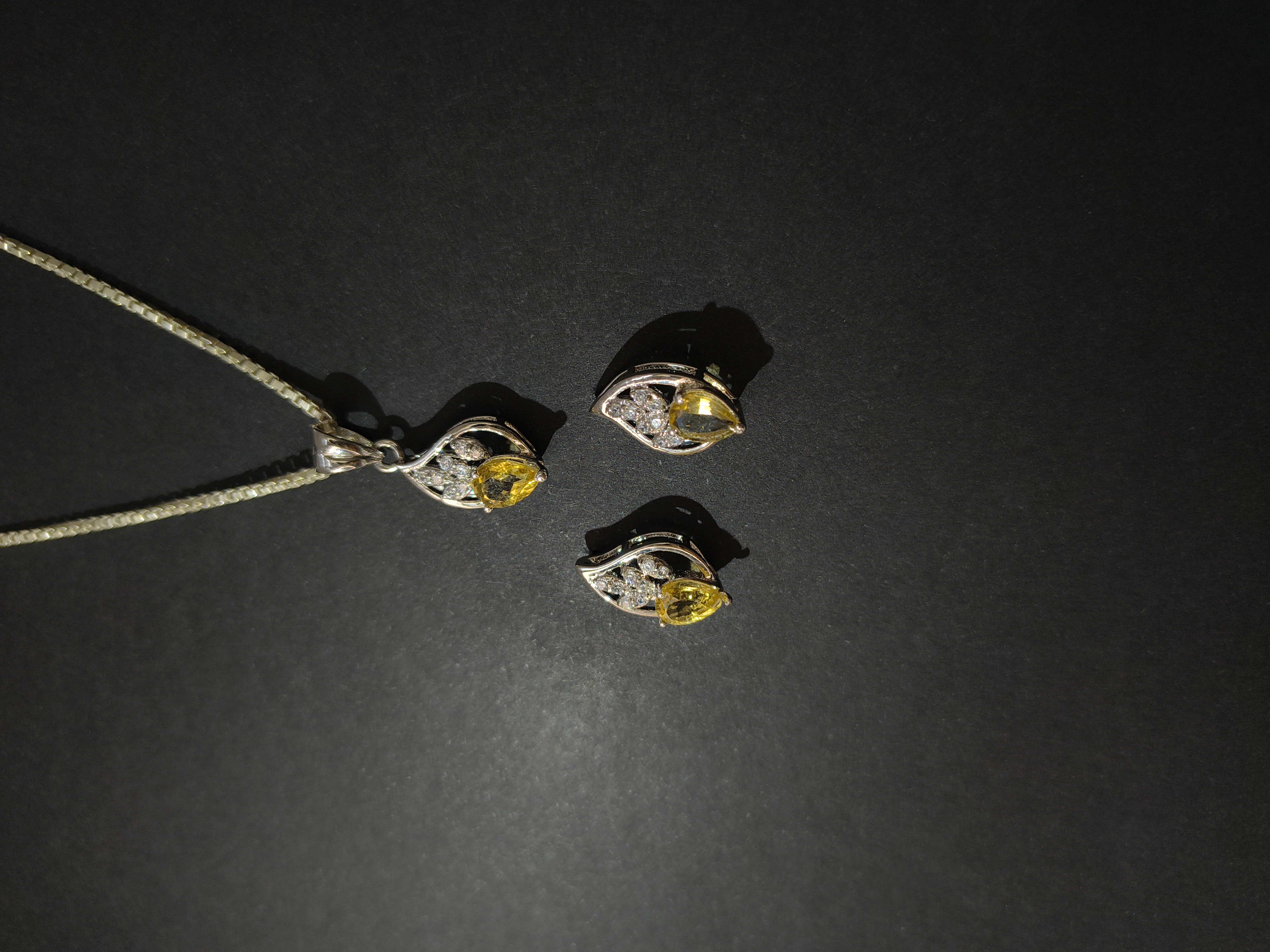 Citrine with Zircon in leaf framework