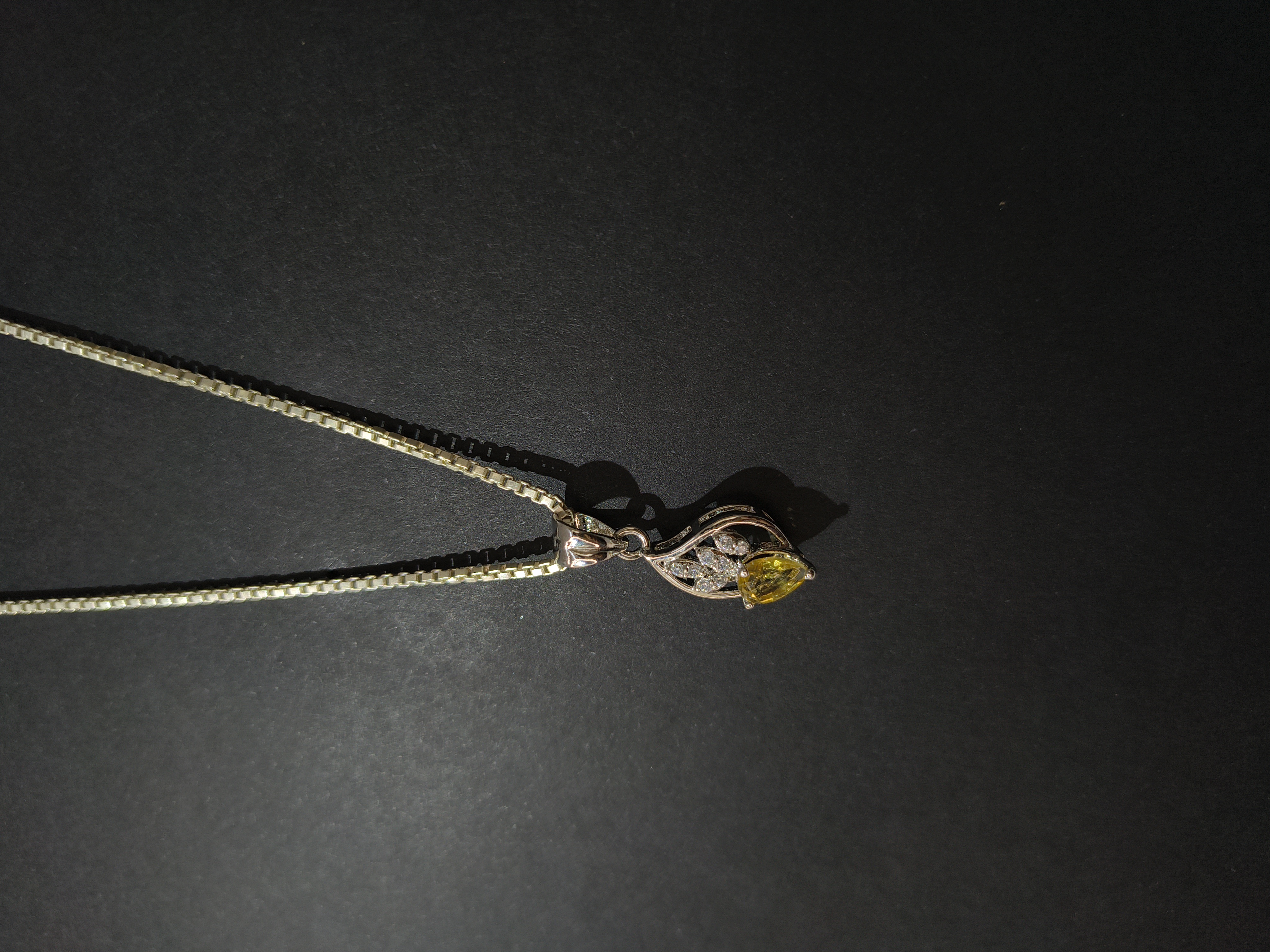 Citrine with Zircon in leaf framework