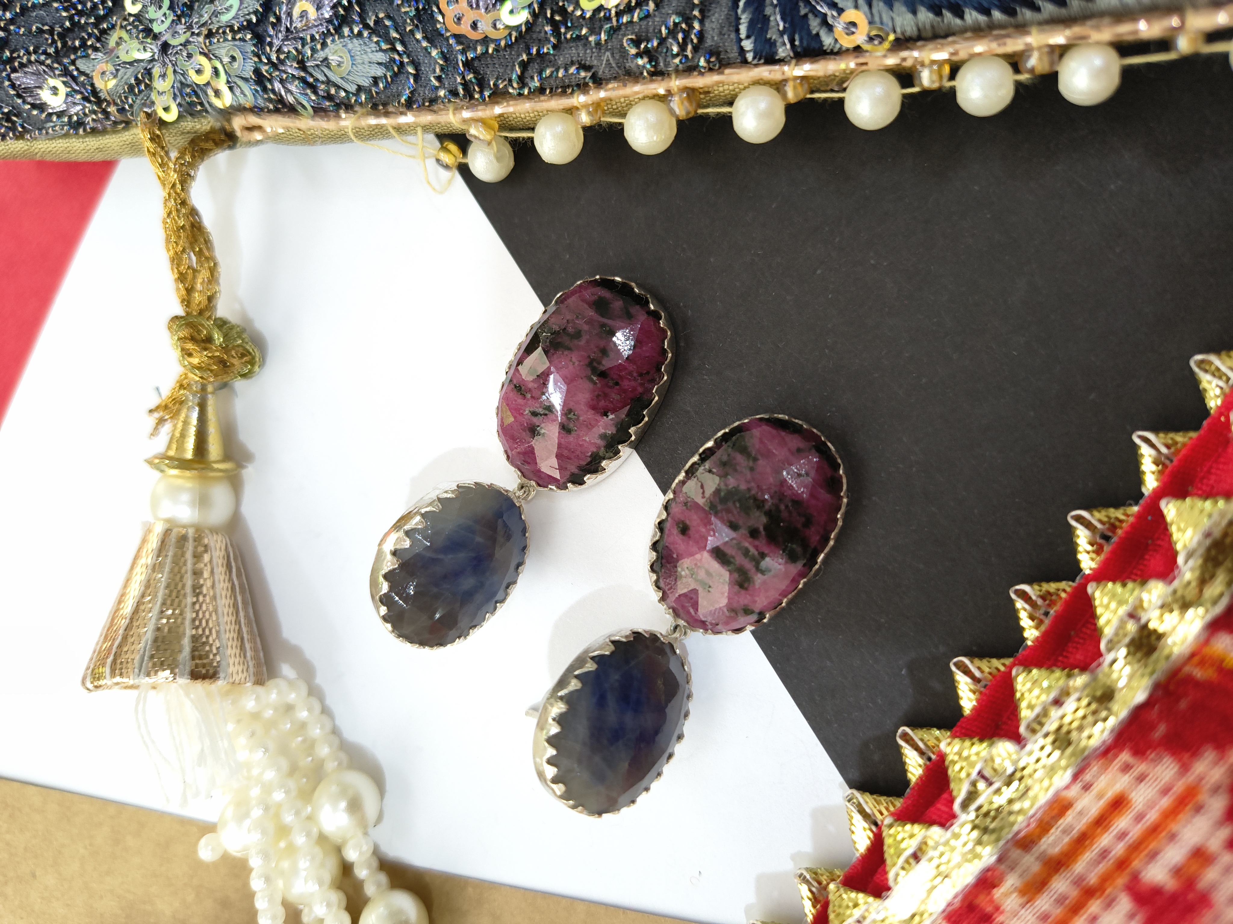 Red and Black graded sapphire earing