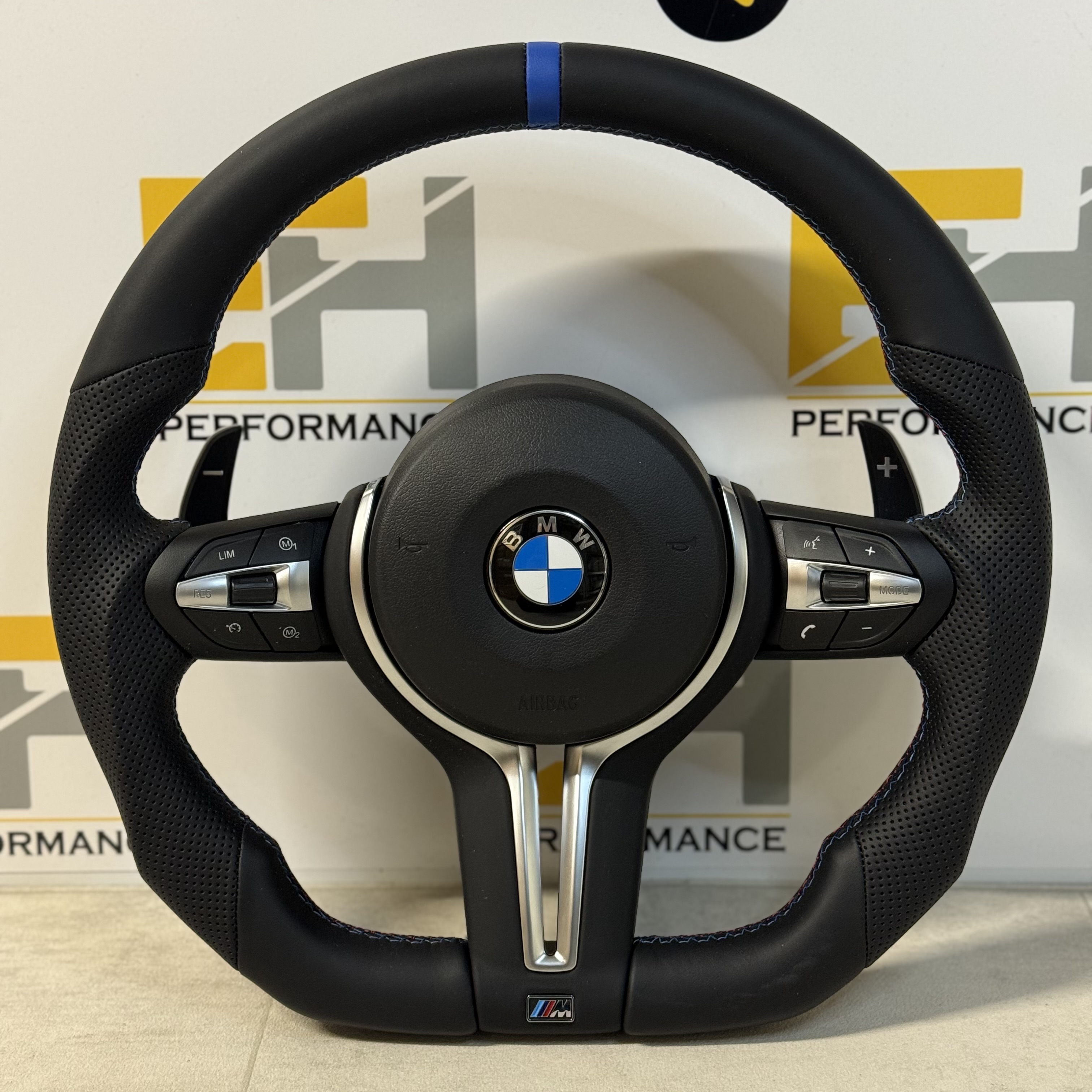 BMW custom perforated leather steering wheel with m sport and blue centre stripe