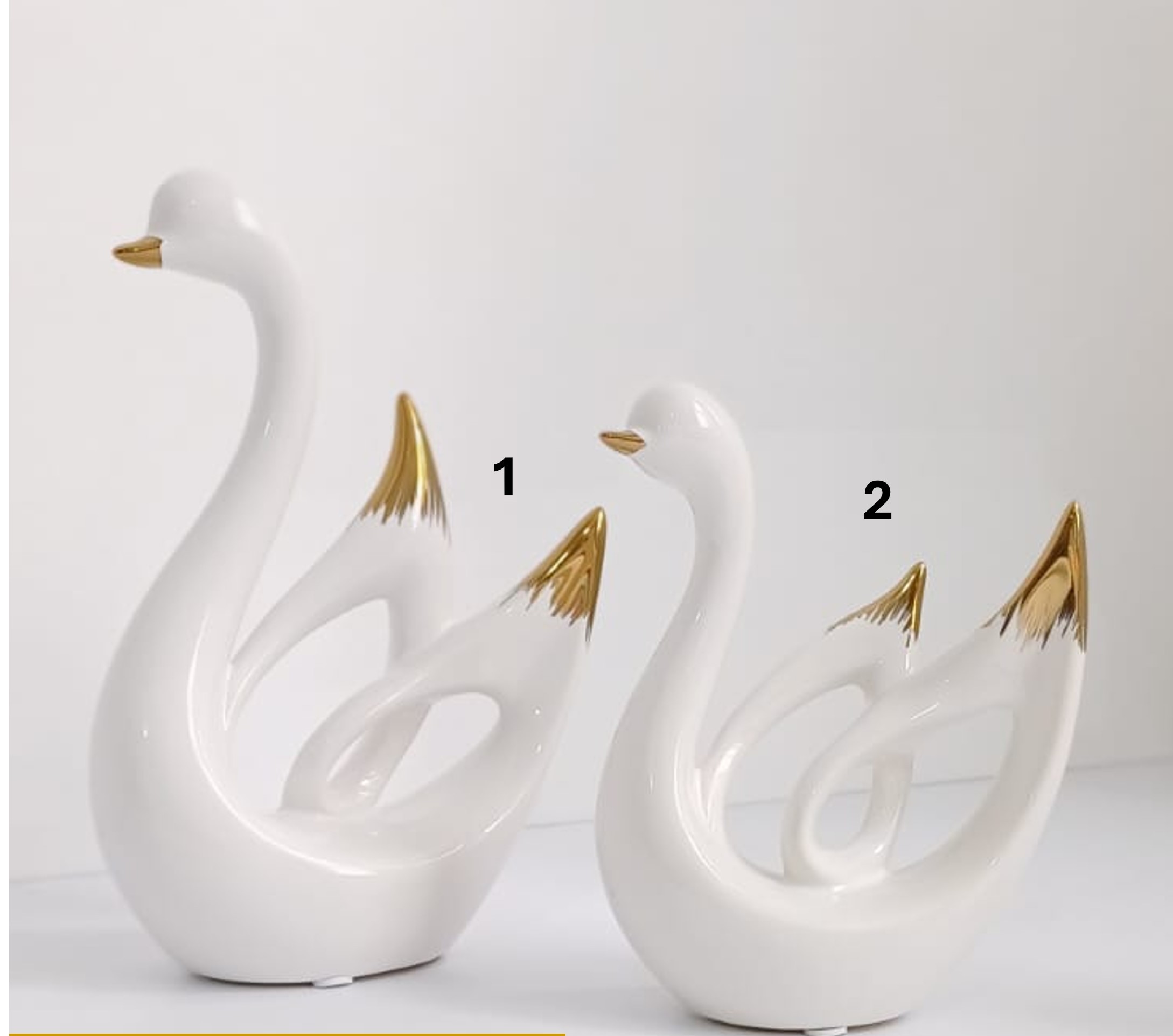 Figuras de cisnes de cerámica