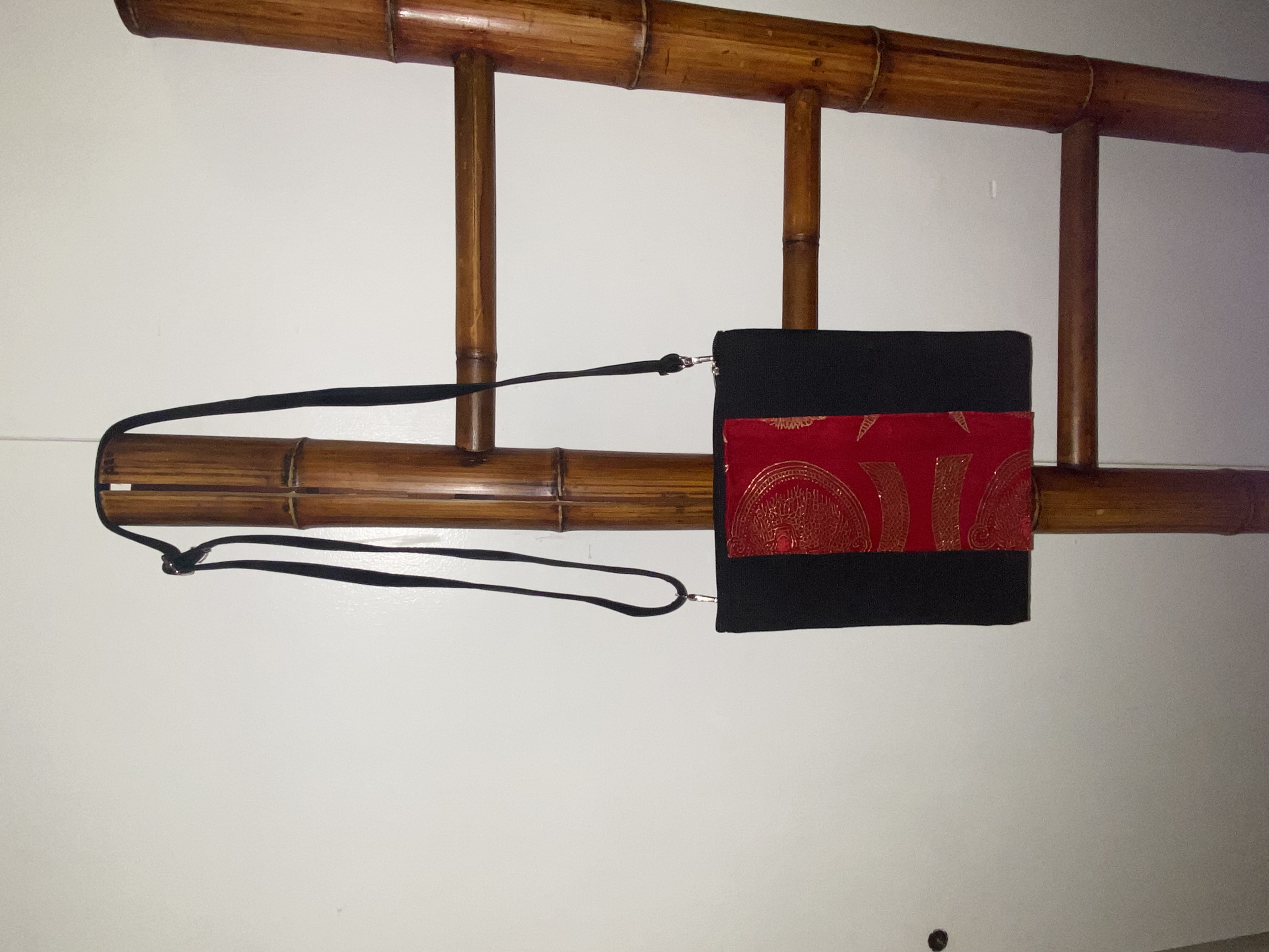 Elegant Black and Red Crossbody Bag