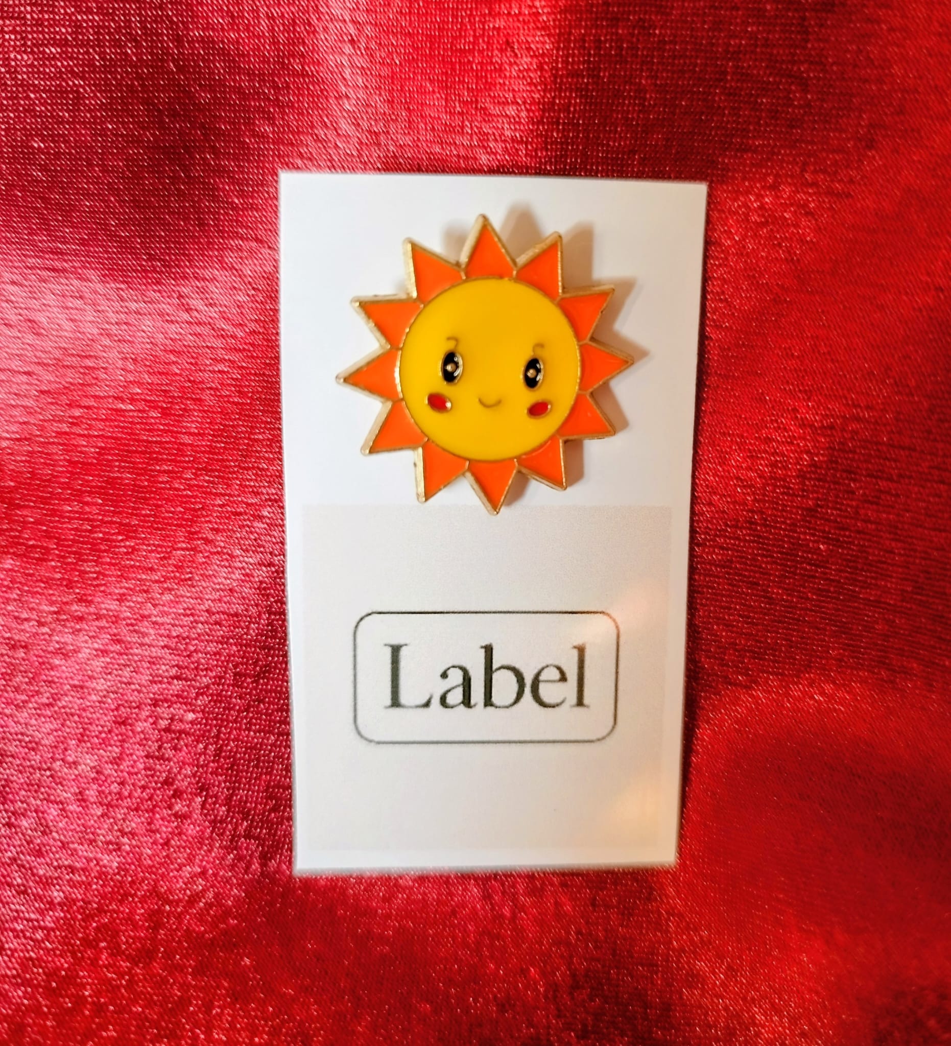 Pin de sol sonriente