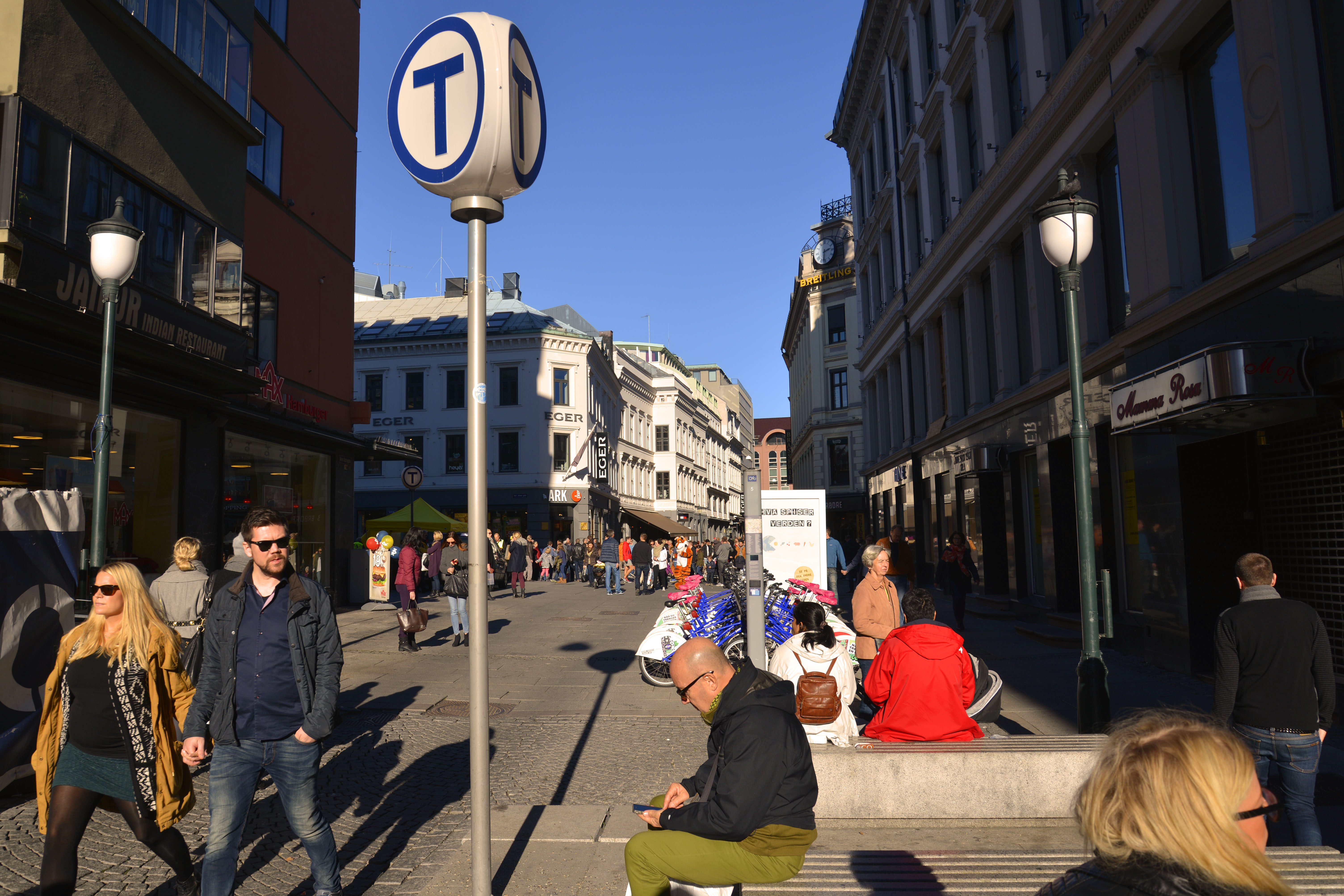 Oslo Pedestrians in Plaza on Sunny Day