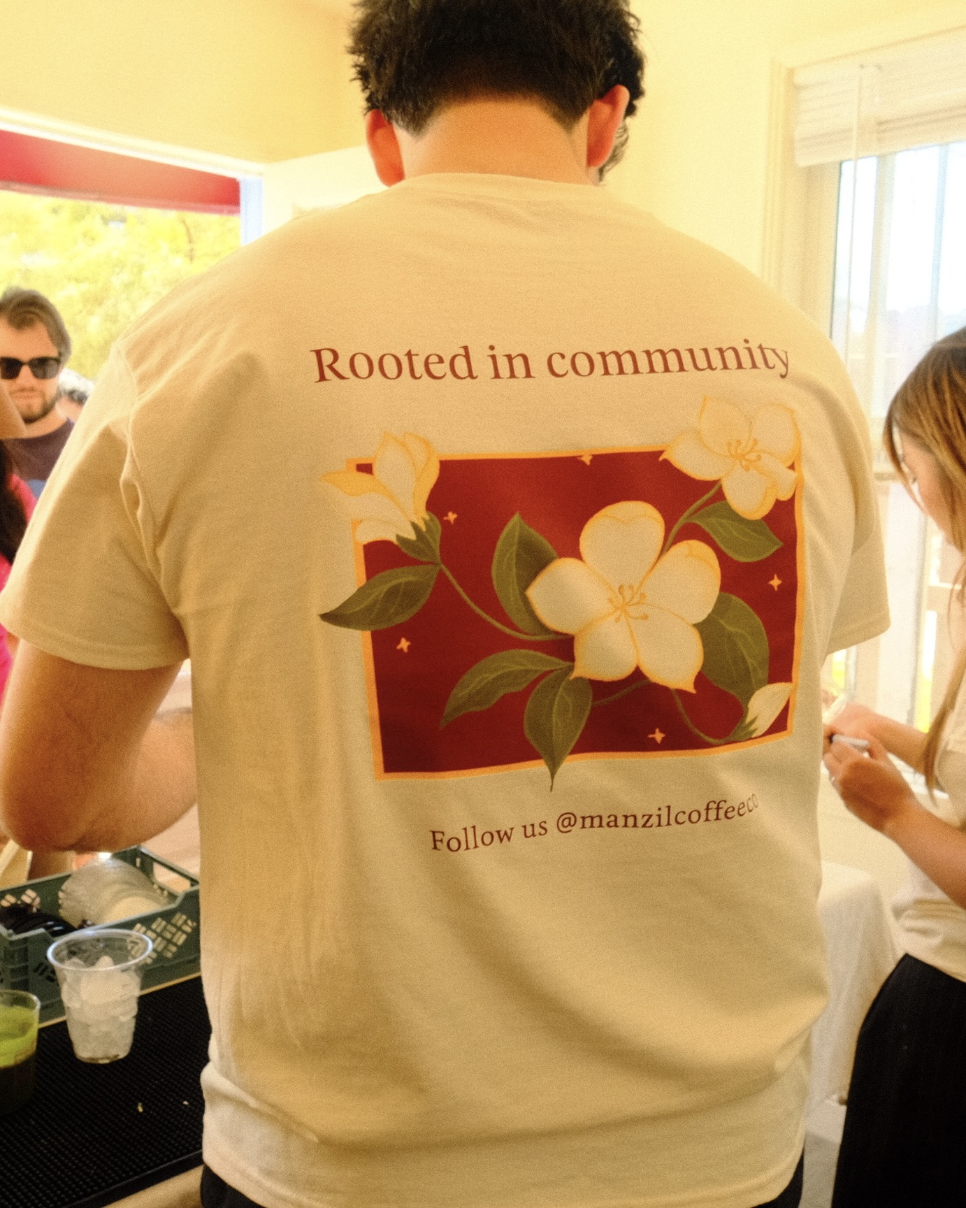 Rooted in community tee