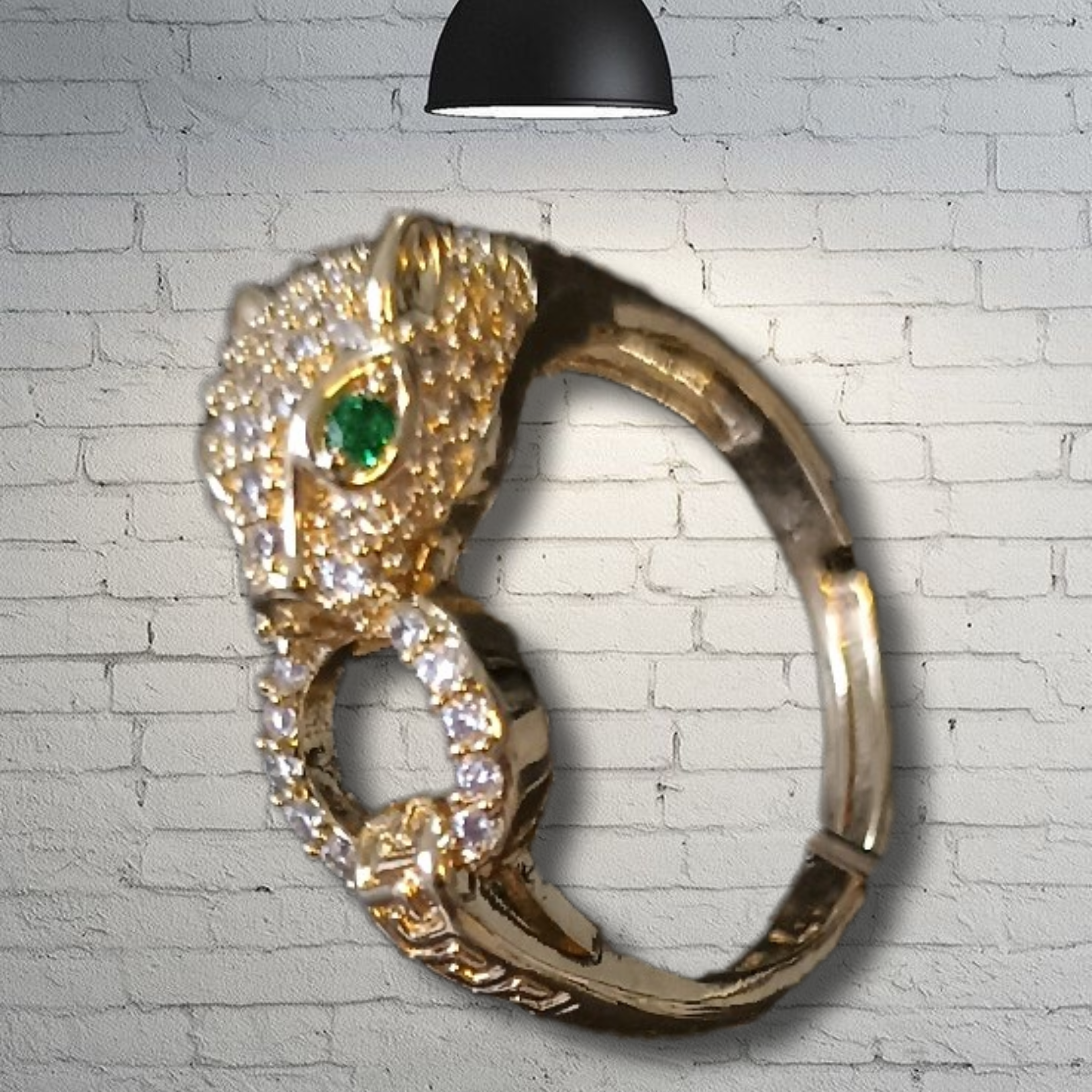 Anillo de pantera dorado