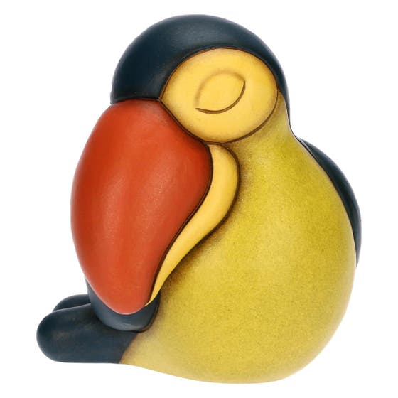 Tucano medio occhi chiusi