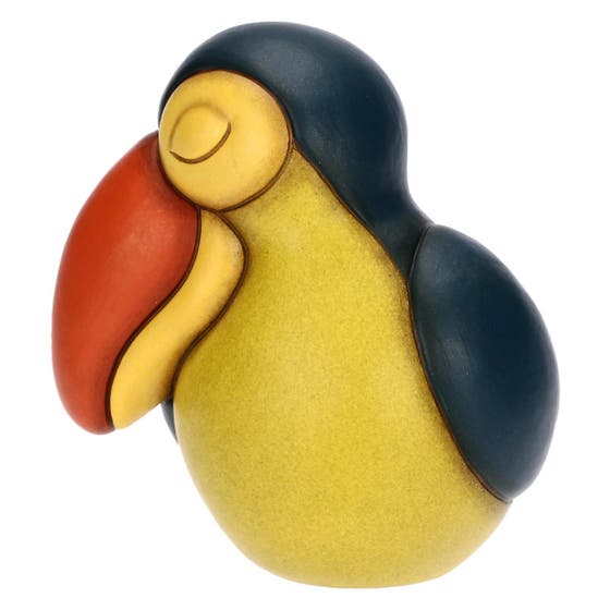 Tucano medio occhi chiusi