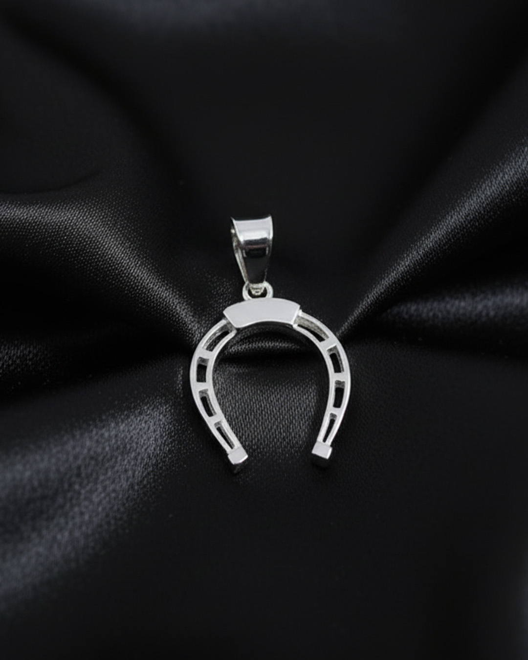 Dije de herradura de plata