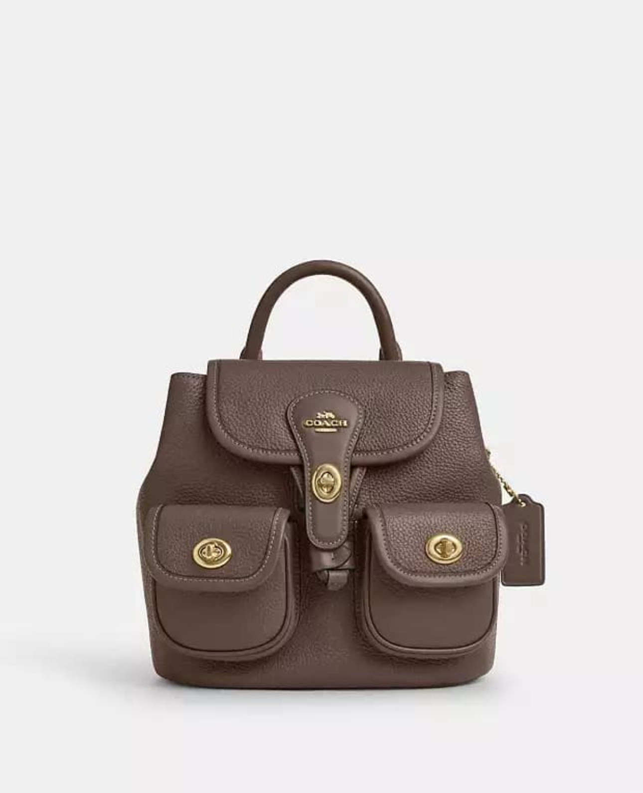 Mochila con herrajes dorados COACH