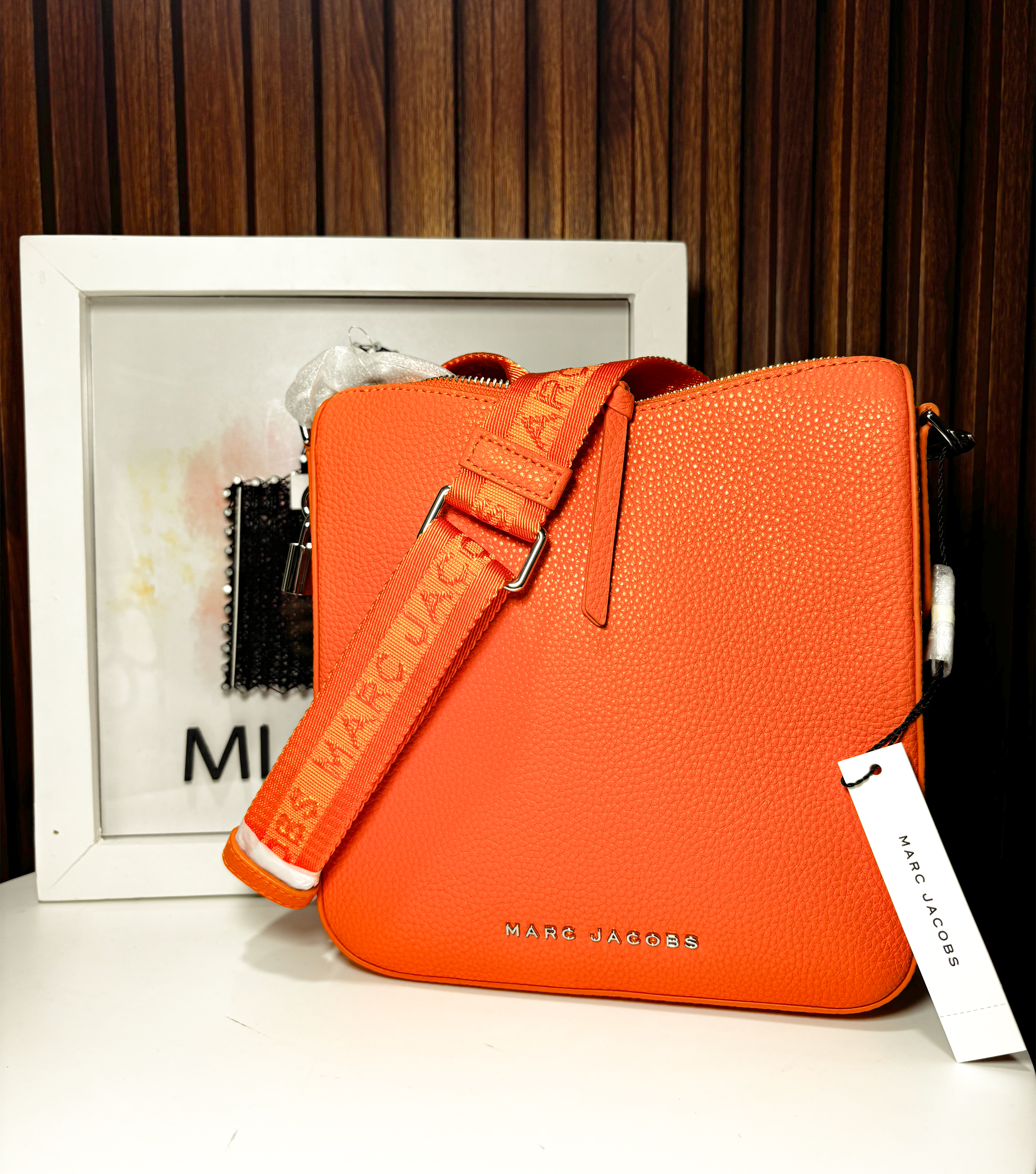 Crossbody naranja con strap