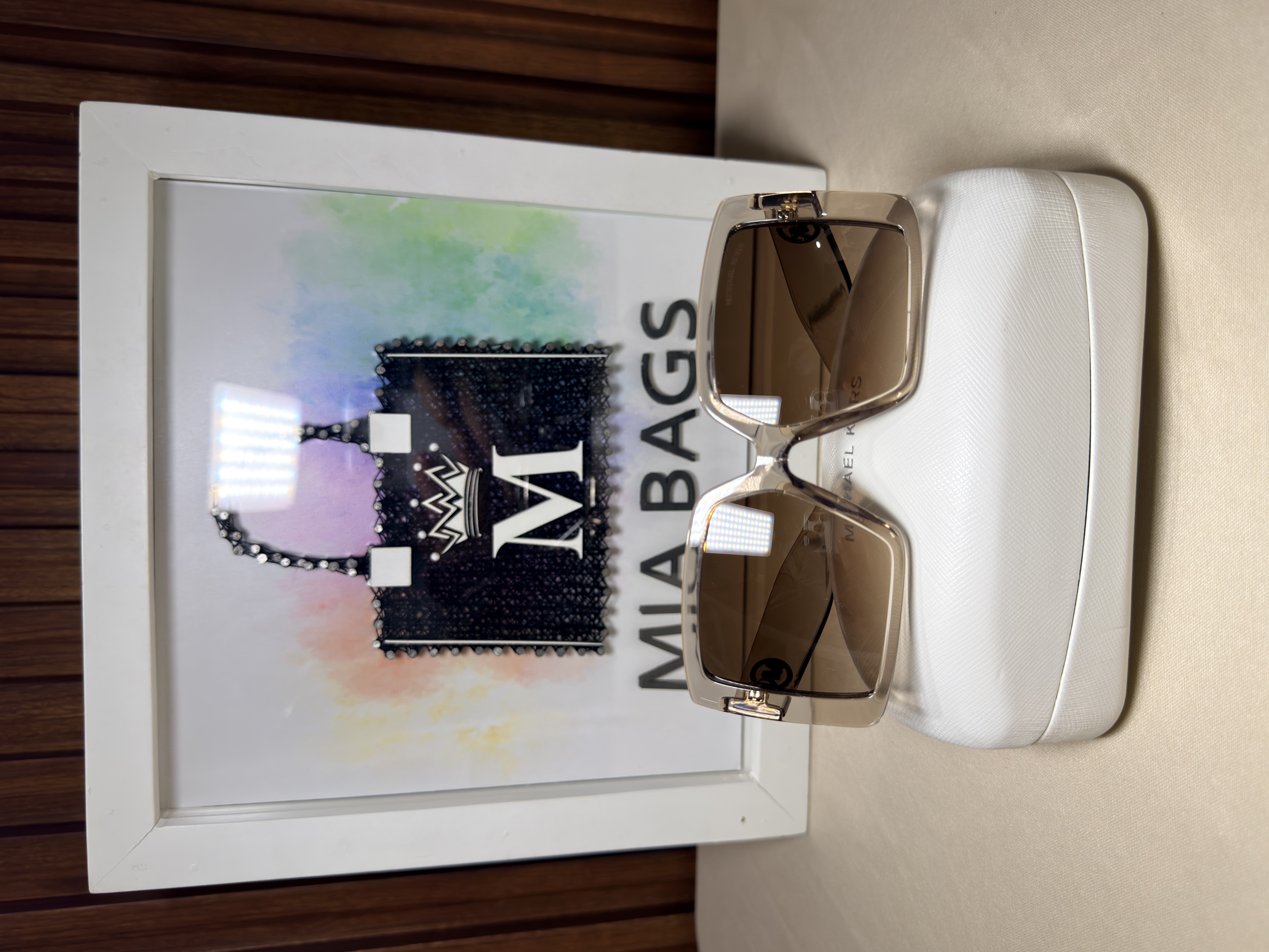 Gafas de sol café con marco semitransparente 