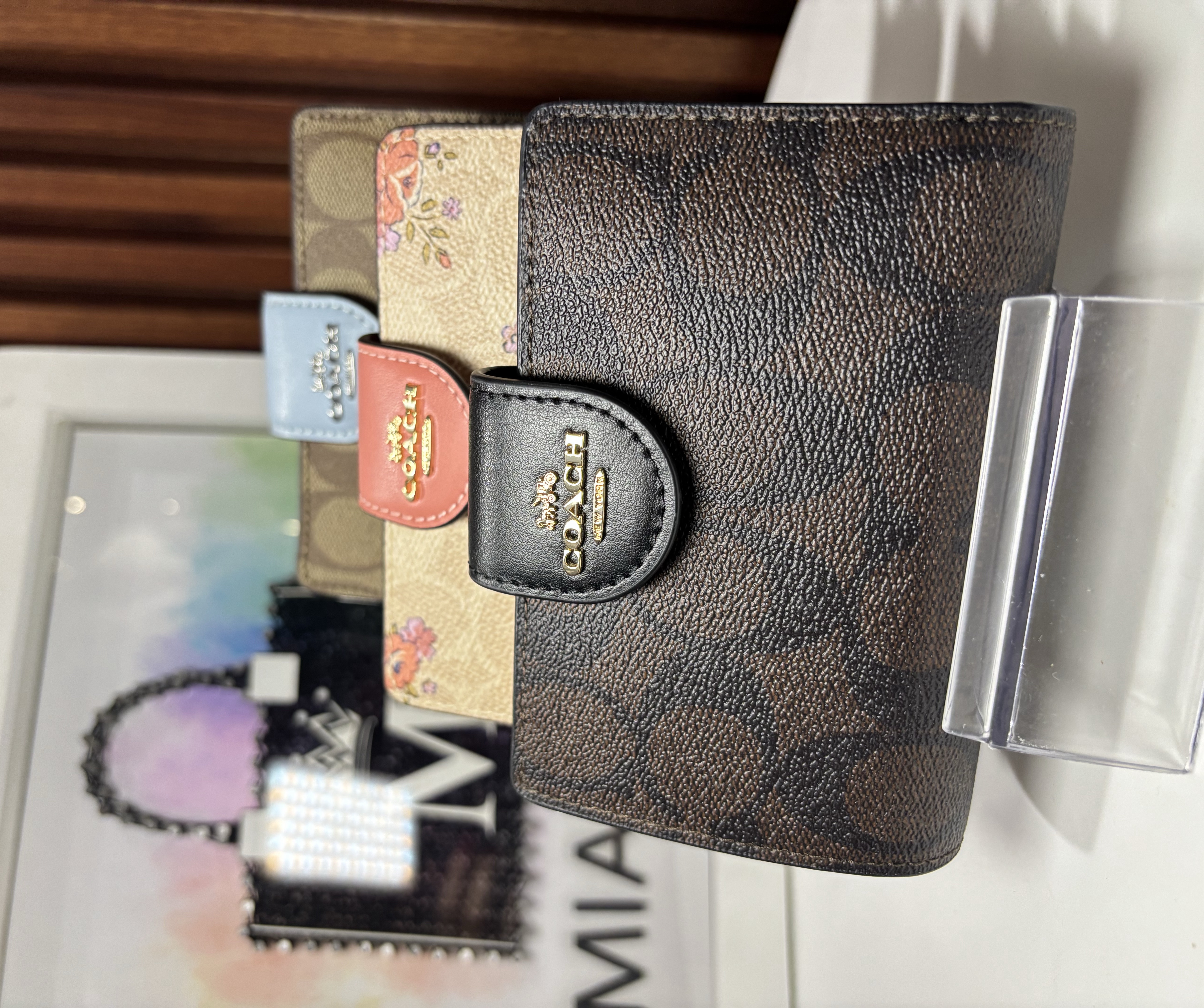 Cartera Coach con clip