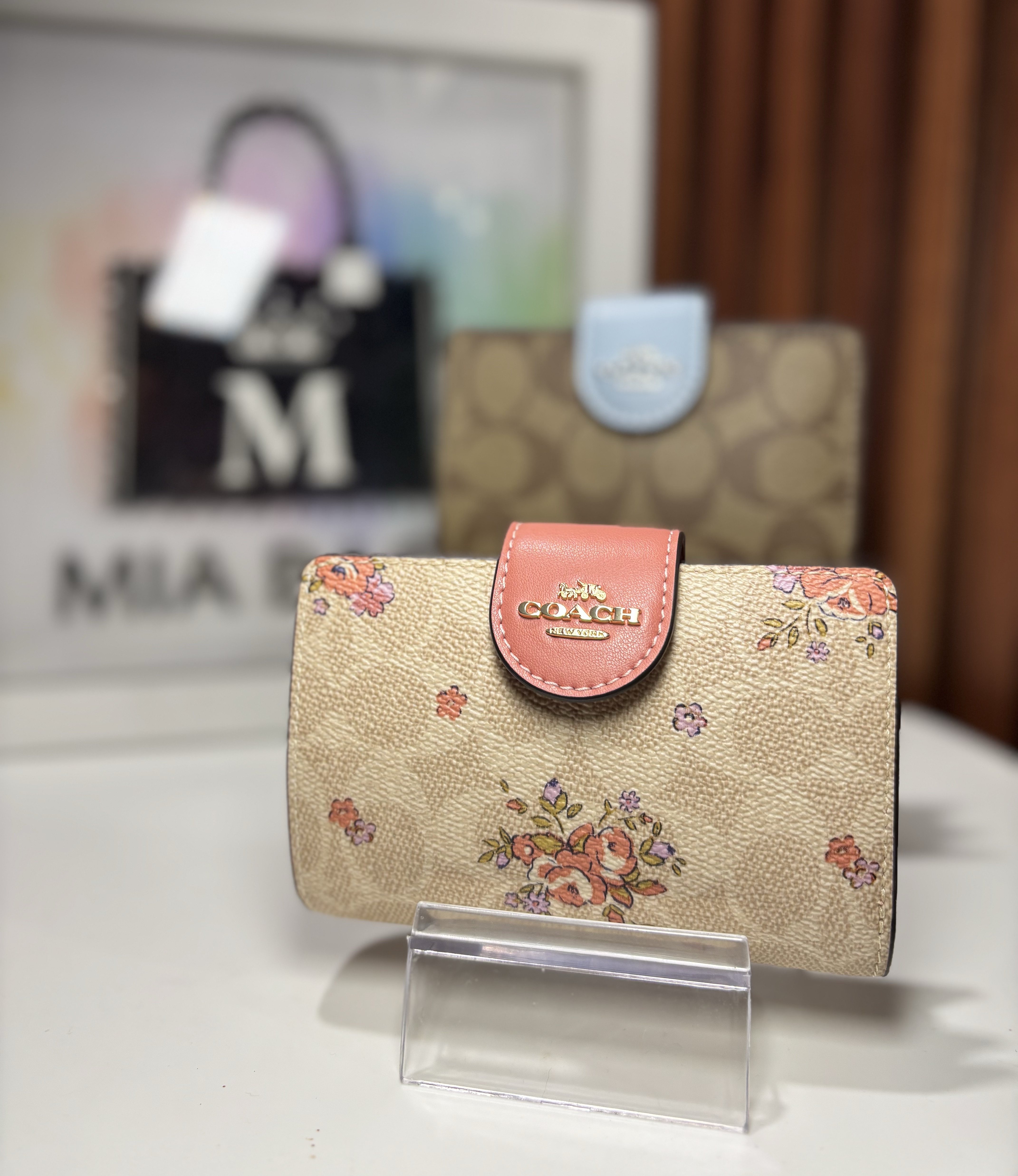 Cartera Coach con clip