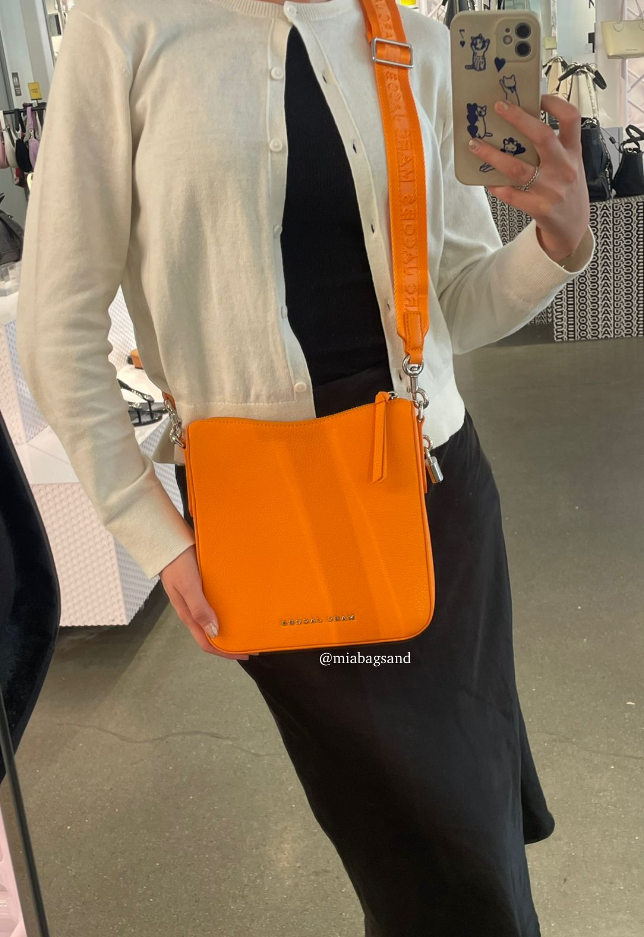 Crossbody naranja con strap