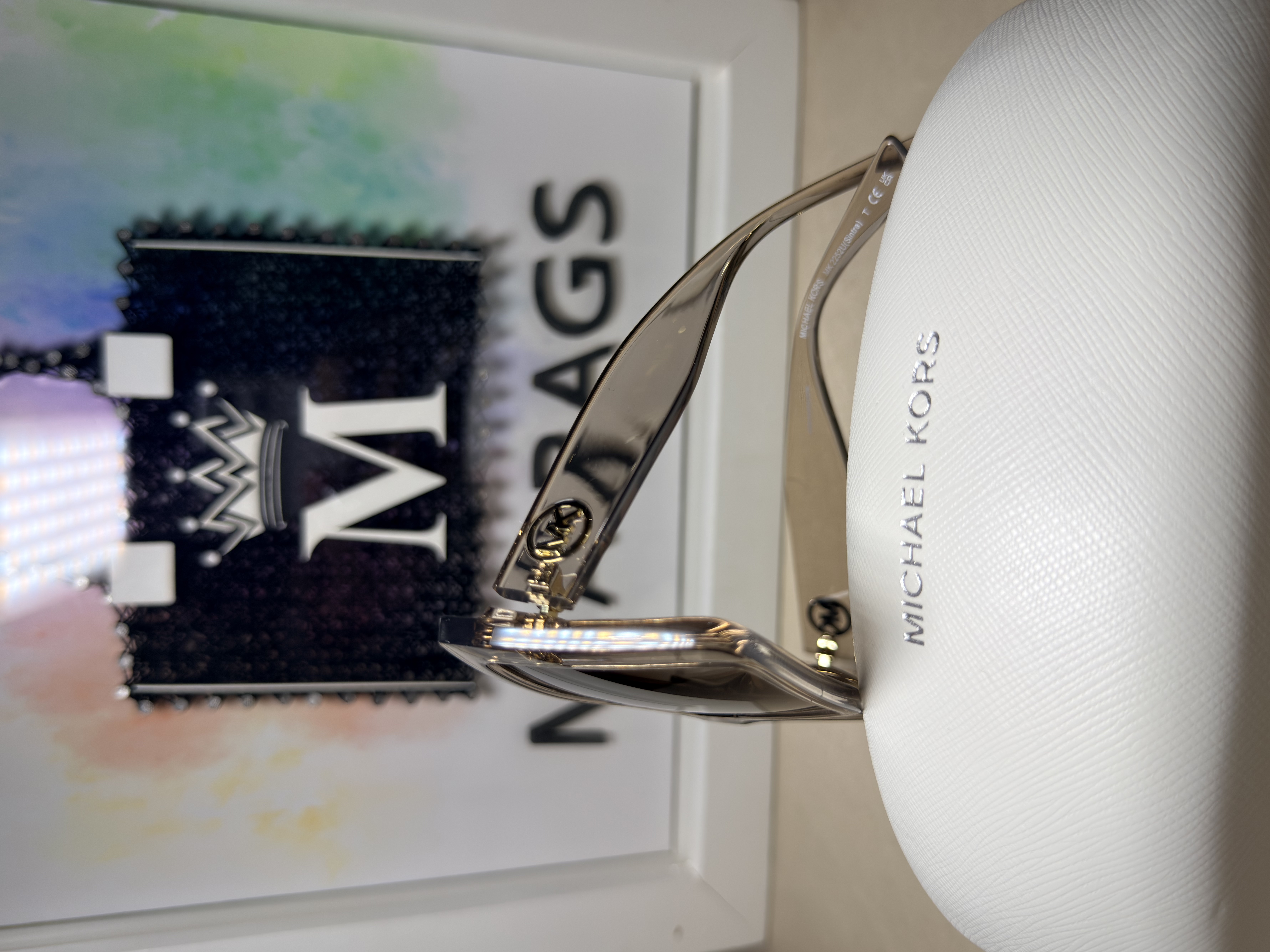 Gafas de sol café con marco semitransparente 