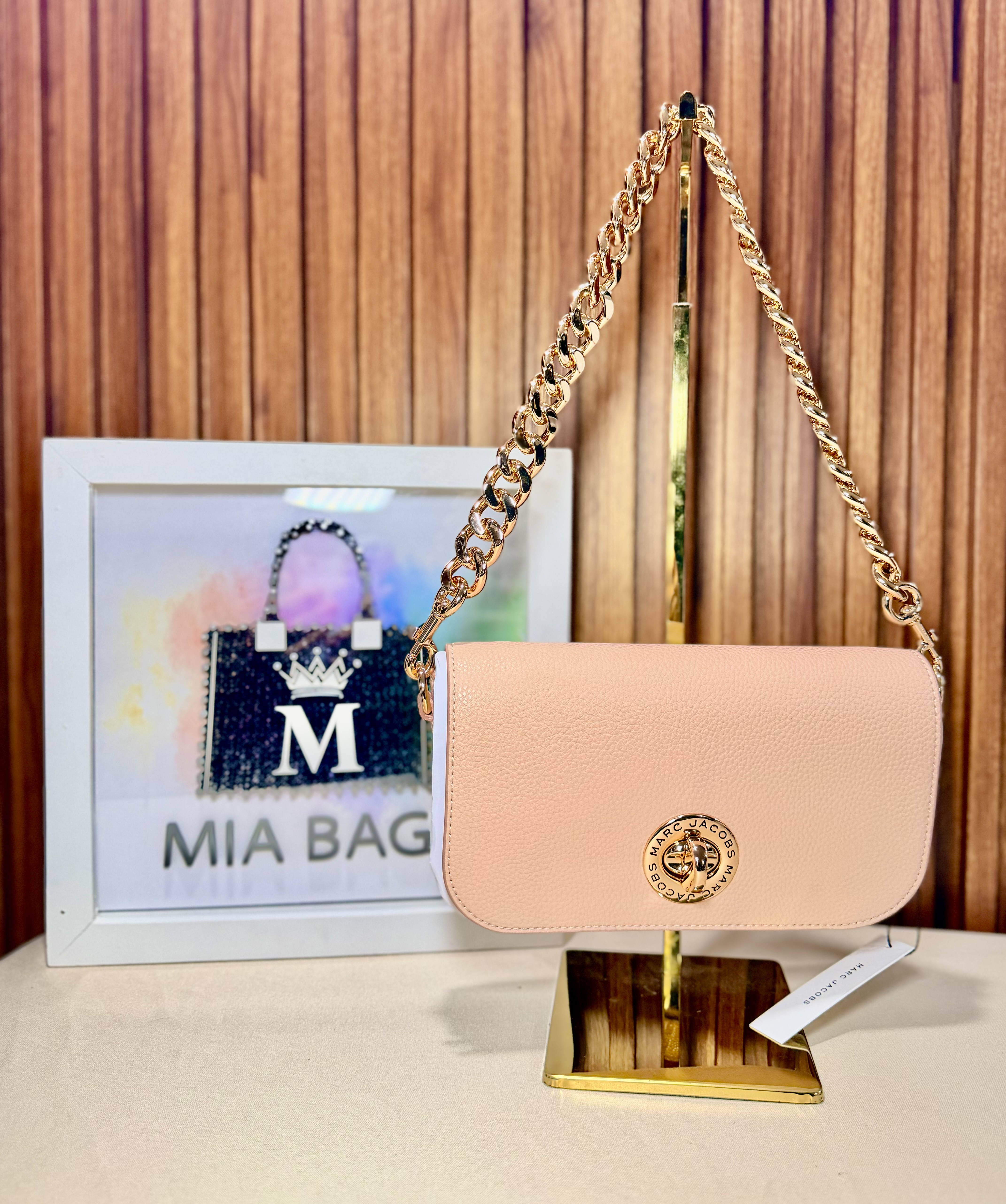 Turn lock bag rosa con cadena