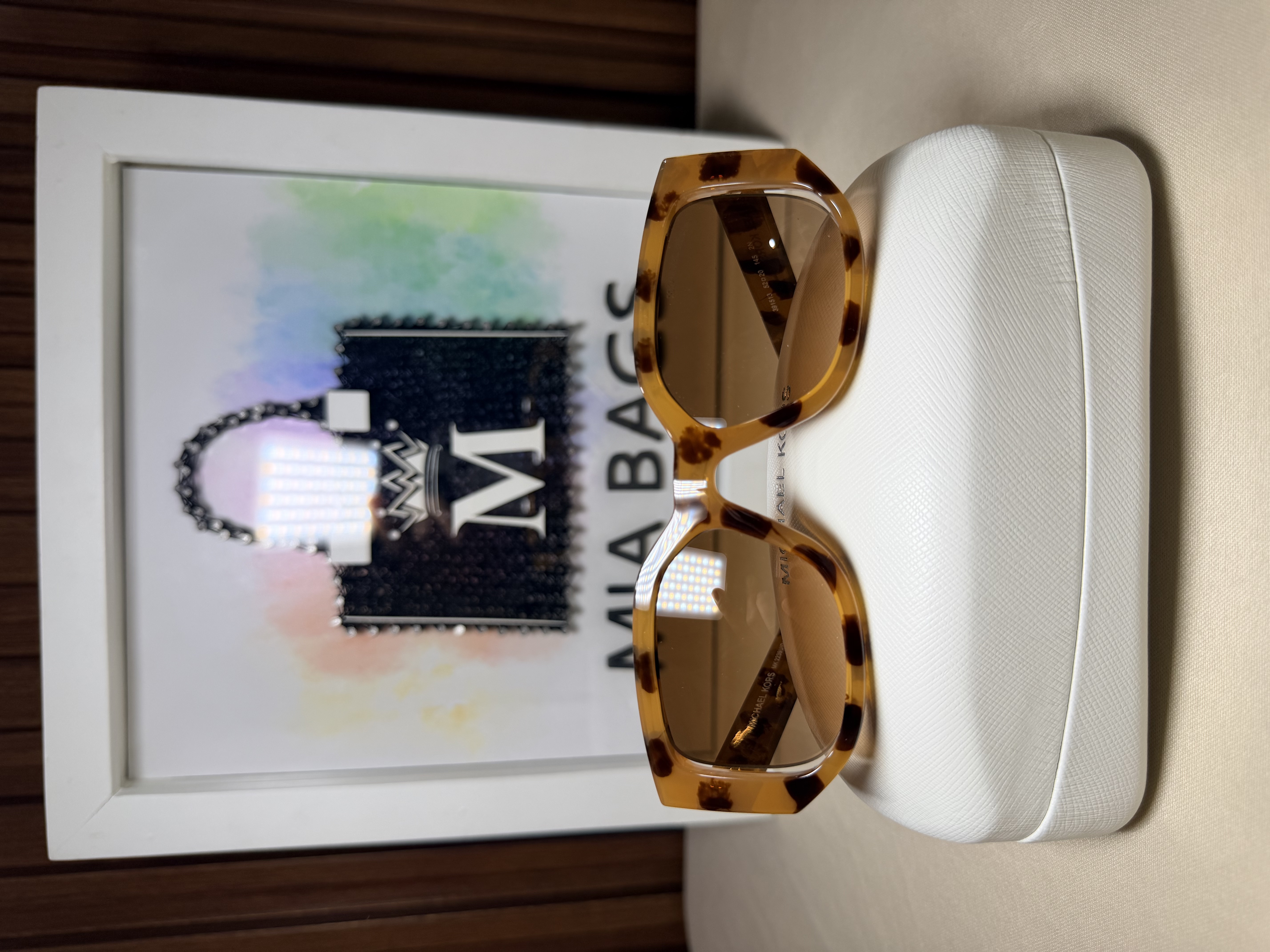 Gafas de sol cuadradas con detalles cafés