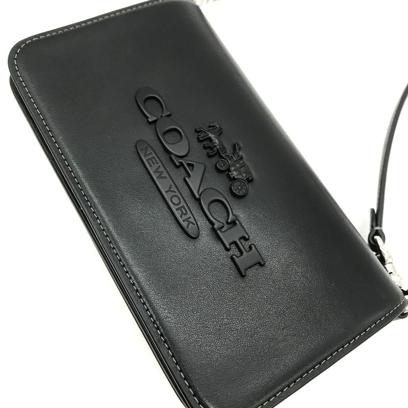 Bolso negro con strap largo 