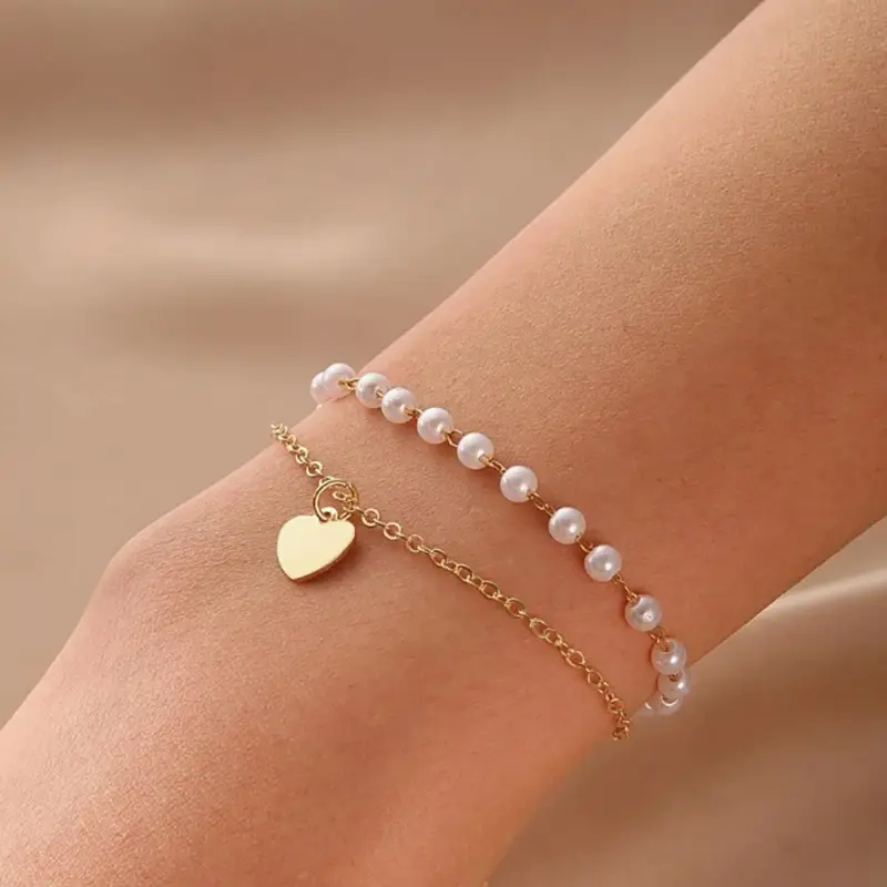 10 Piece Gold Heart Bracelet