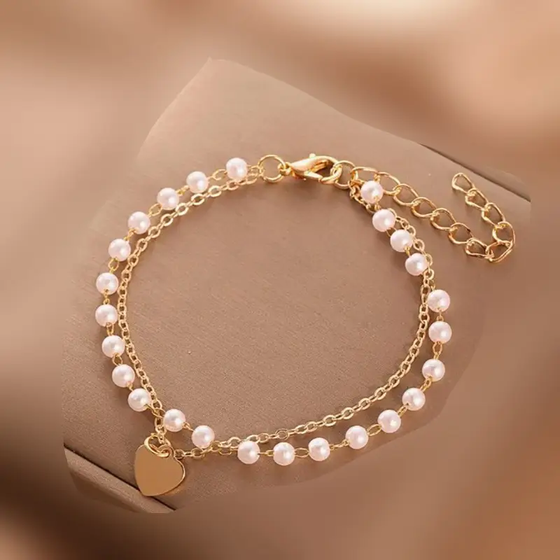 10 Piece Gold Heart Bracelet