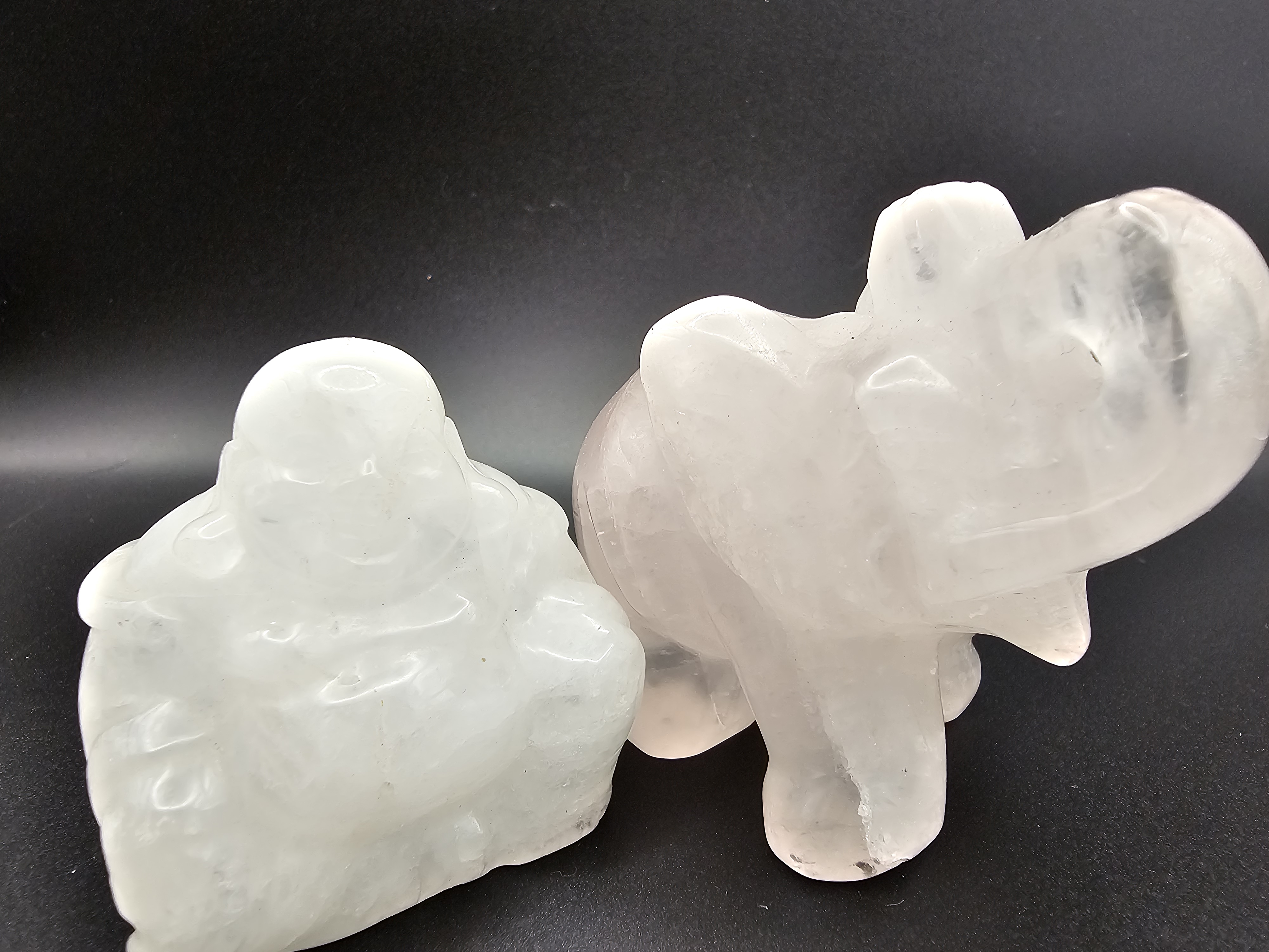 Clear Quartz Happy Buddha and a Rose Quartz Elephant set.