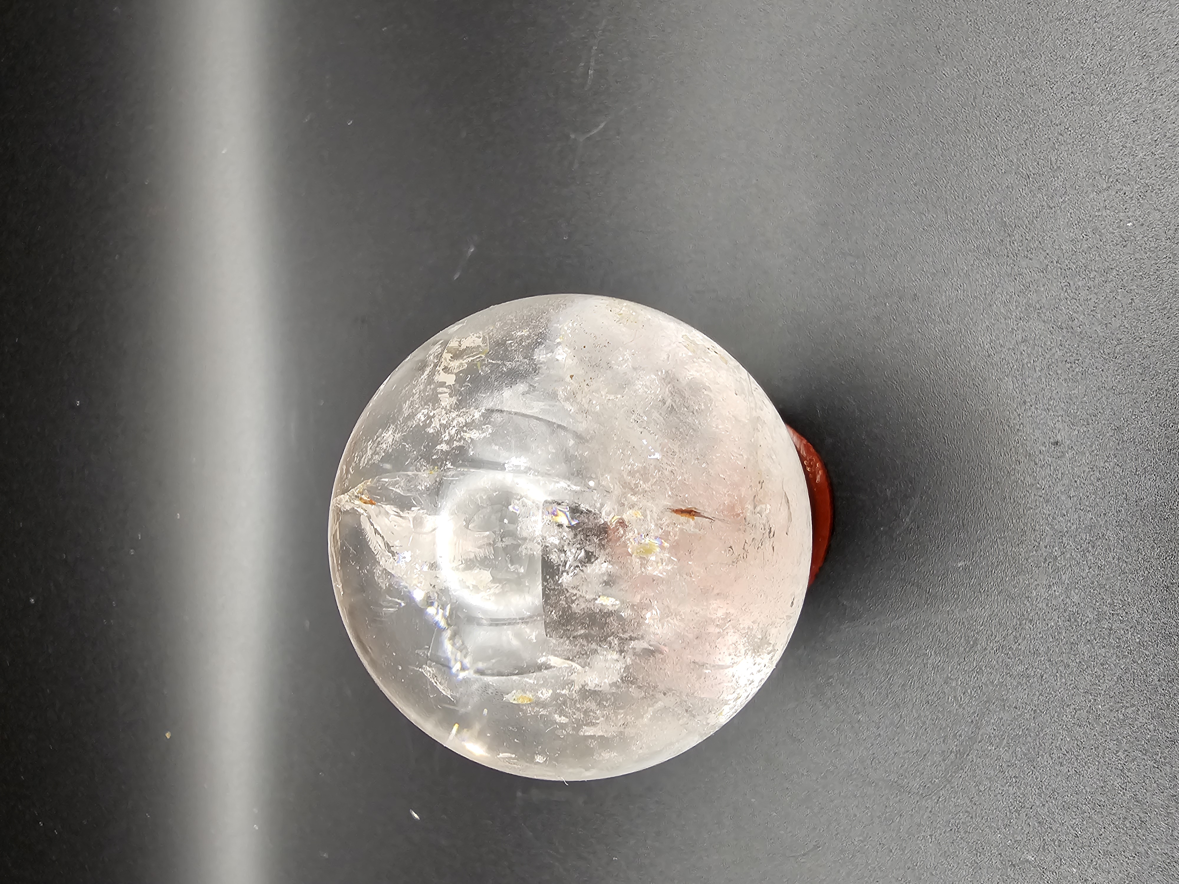 Ultra Clear Quartz Sphere with hint of Golden Healer