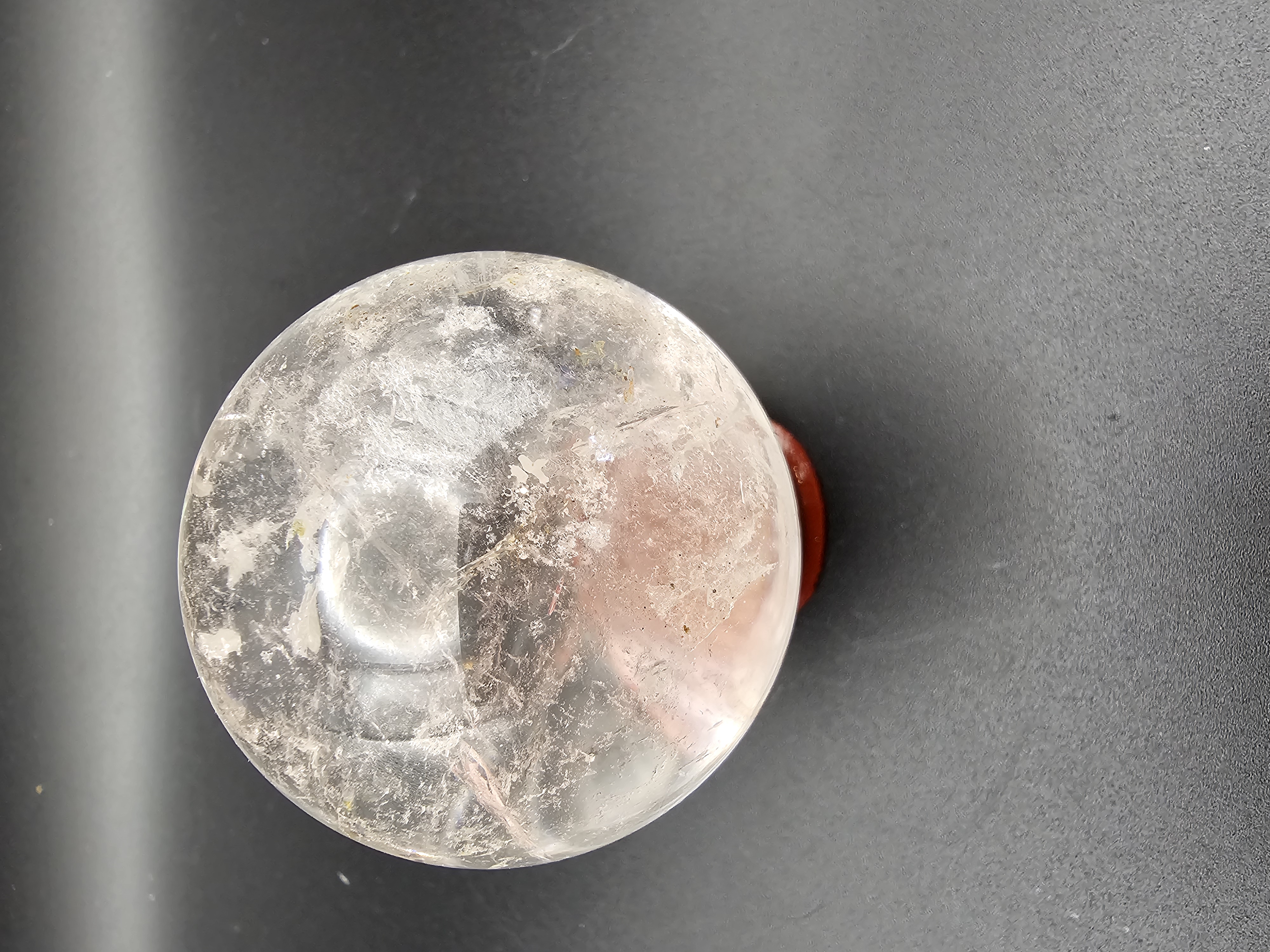 Ultra Clear Quartz Sphere with hint of Golden Healer